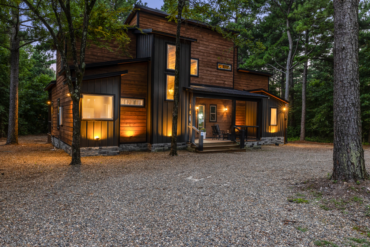 Spend your evenings under the trees, listening to nature from the deck before retreating inside to cozy modern comfort.