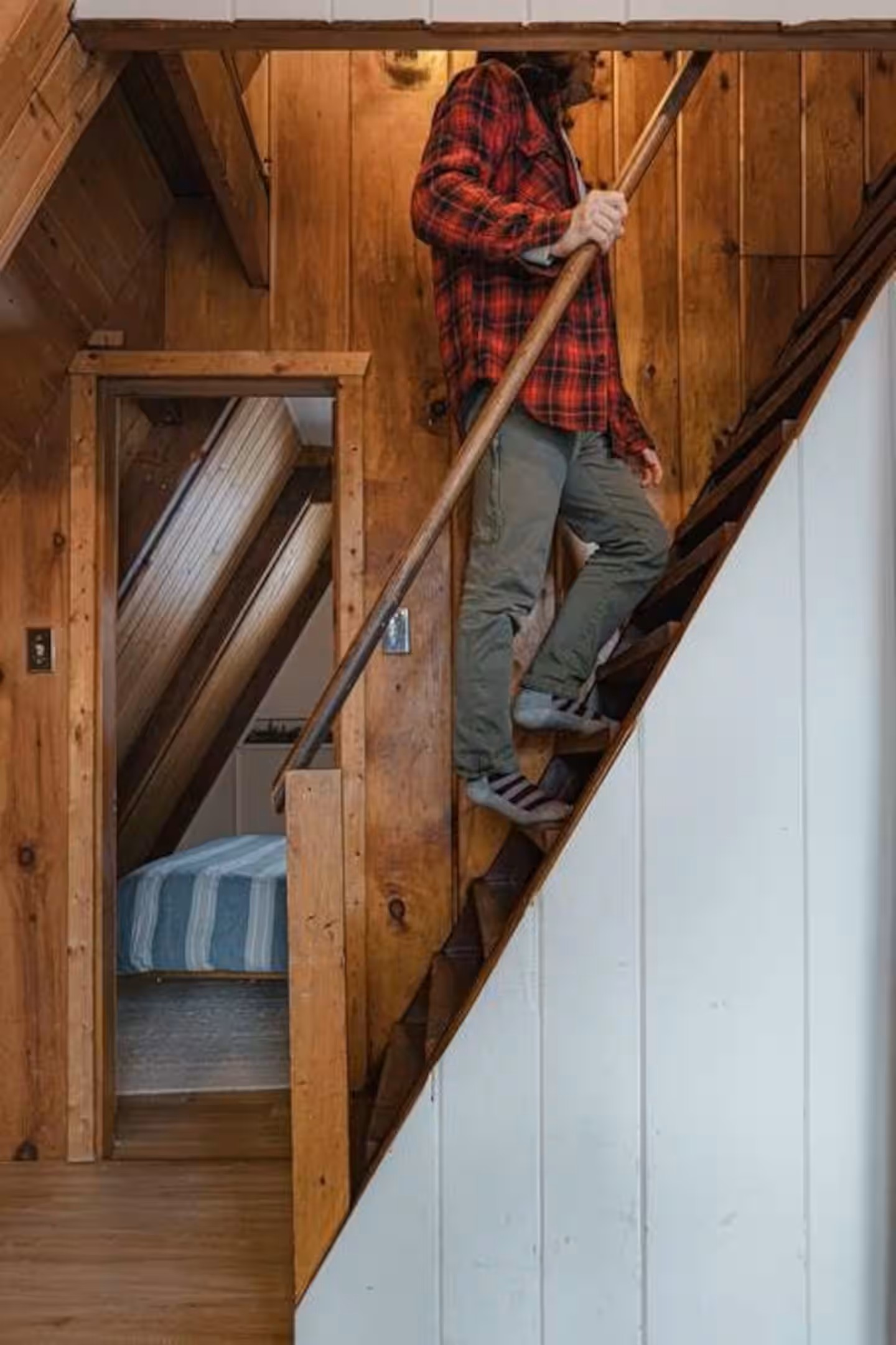 The loft area is accessible via steps. They are steep, but there is a railing! And to go down, simply walk down backwards, like you would a ladder.