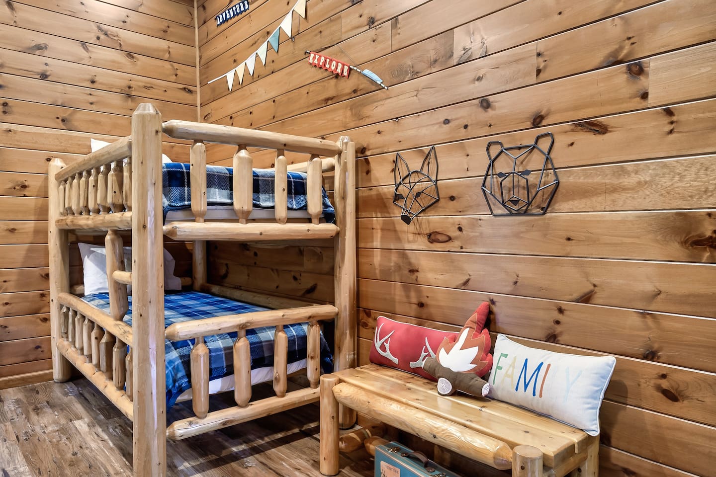 Twin bunk beds are located in an open loft area upstairs between 3 bedrooms