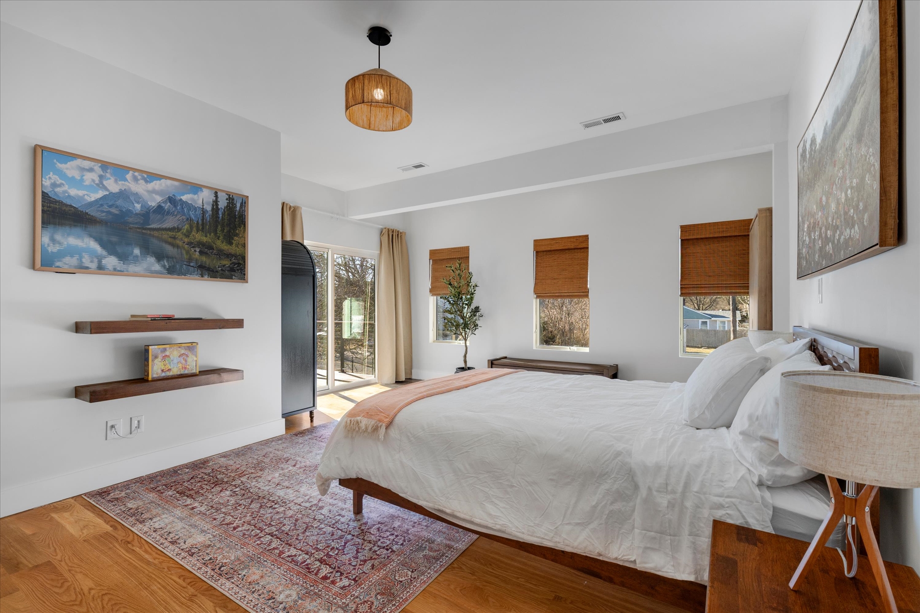 This photo shows location of the TV and sliding doors out to the balcony. 