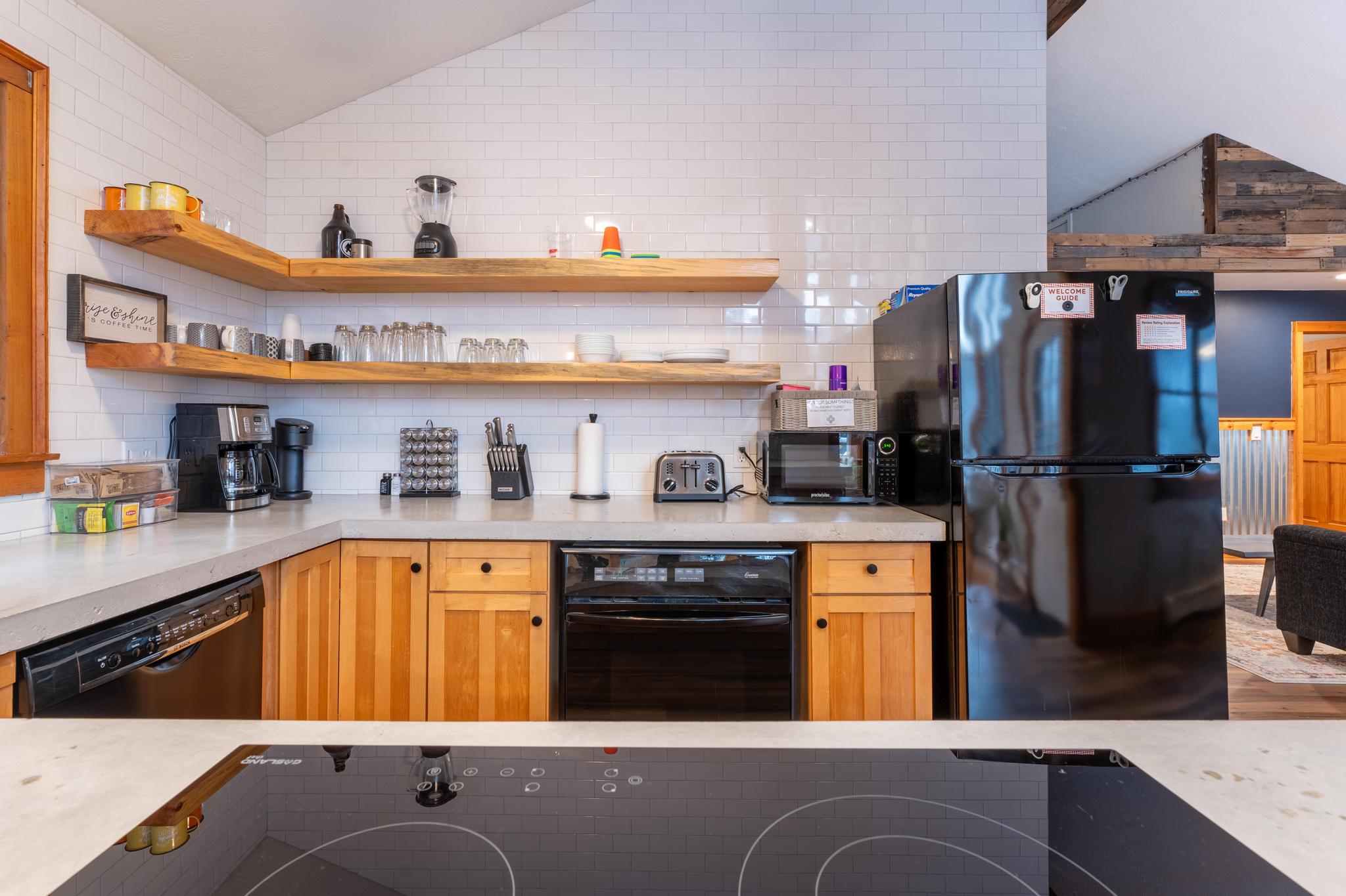 Open concept fully stocked kitchen