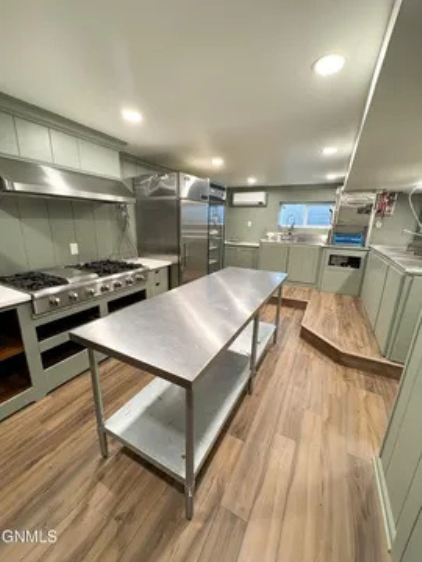 This kitchen setup makes it easy to handle group meals without feeling crowded.