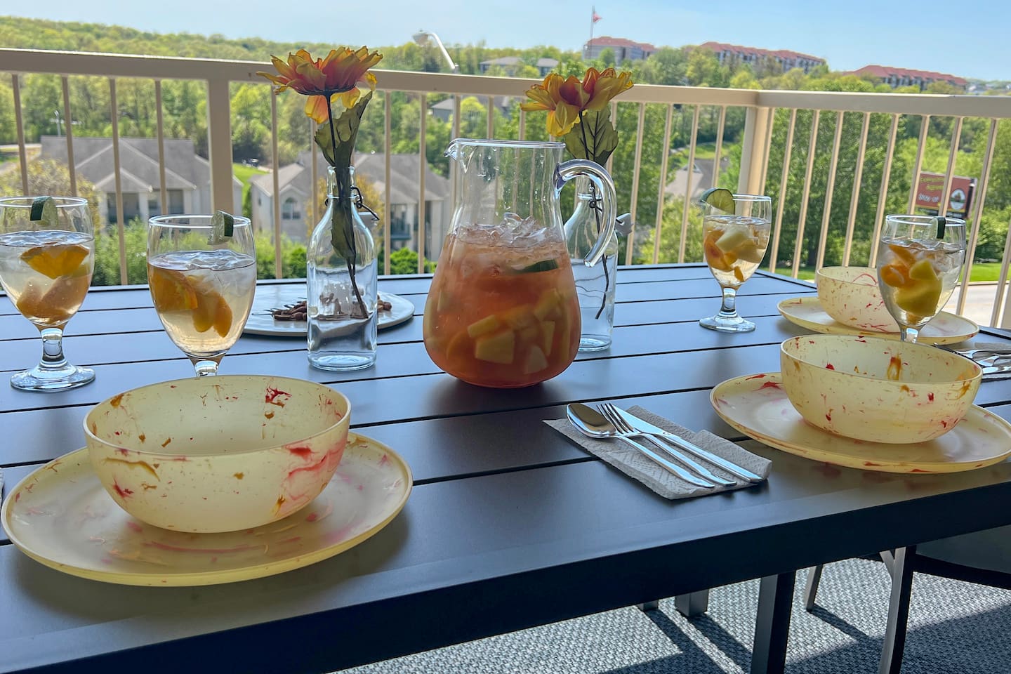 Dining Area: Stunning views and refreshing drinks await on your private balcony!