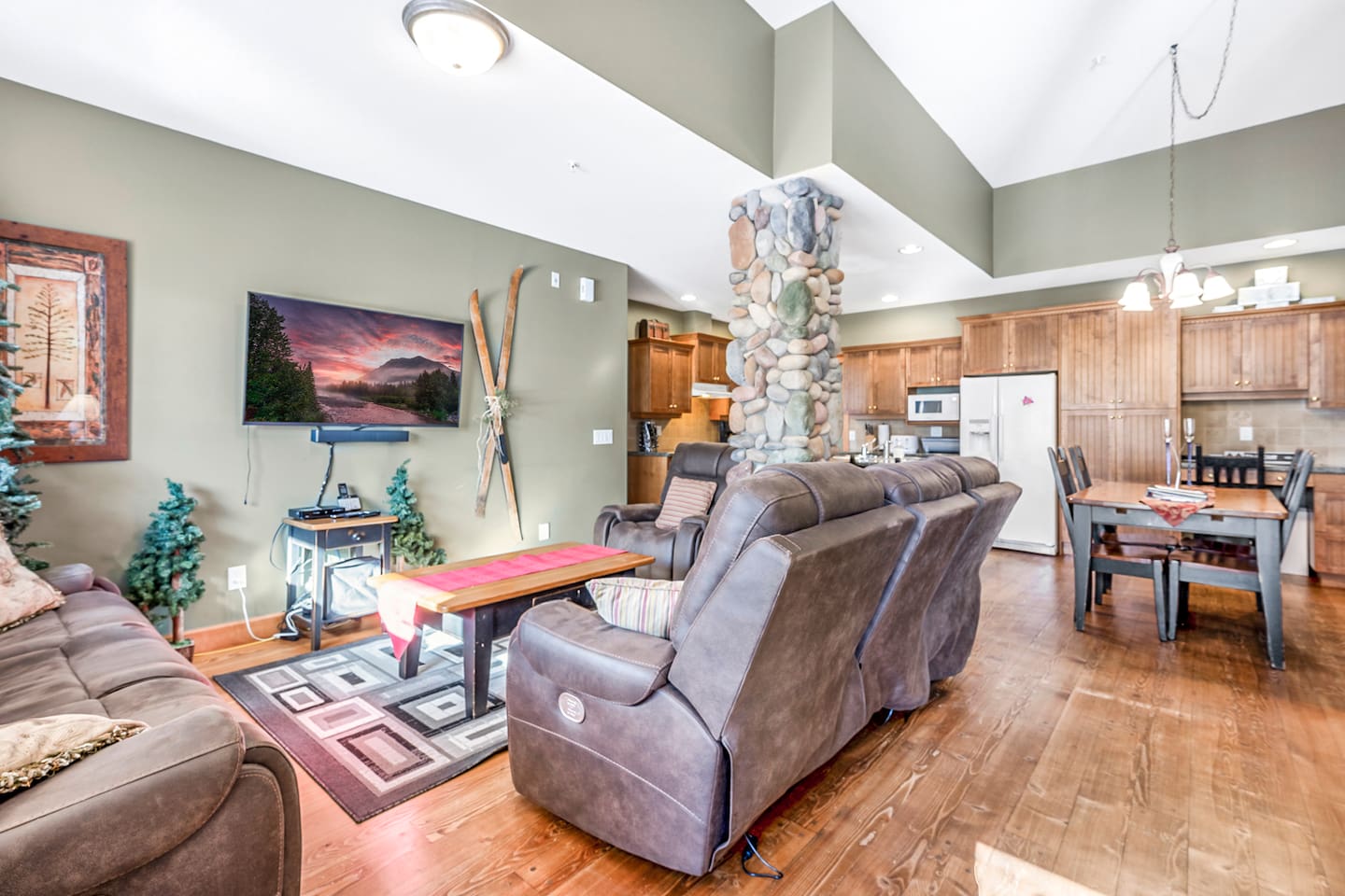 Living room with recliner couches and recliner chair