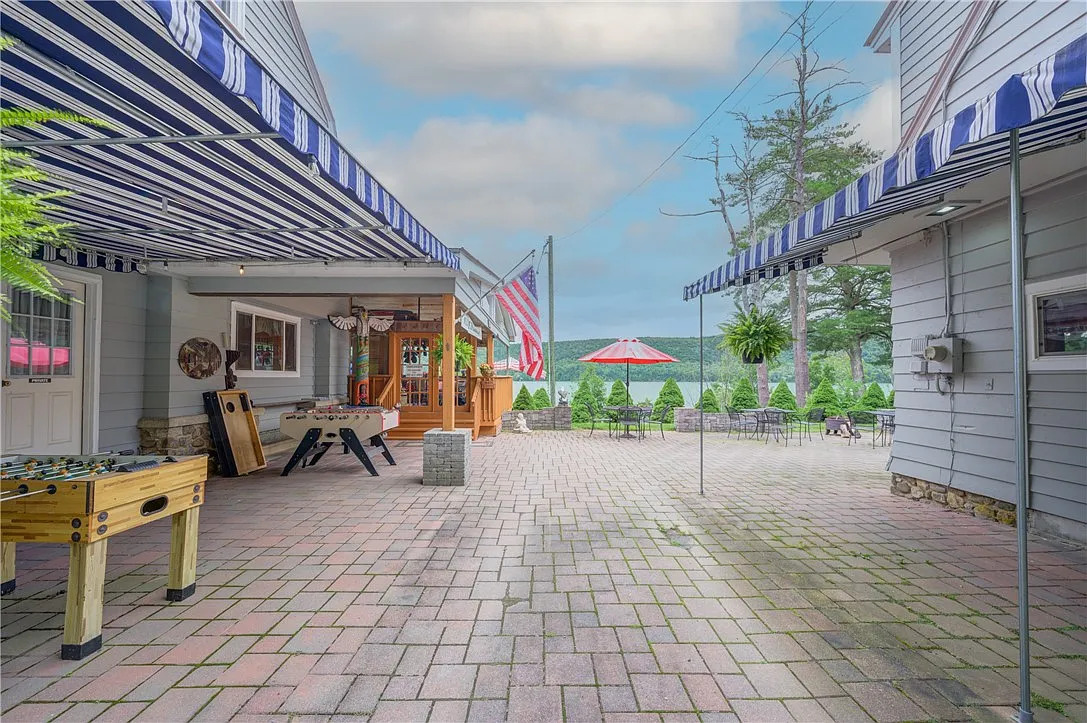 Stone patio between The Lodge and The Nest & Perch