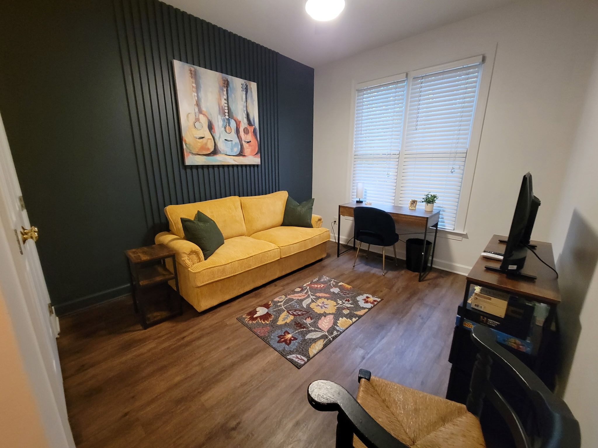 Office/3rd bedroom has pull out queen bed and TV. Also has kids items in closet like pack and play, bouncy seat, and stroller.