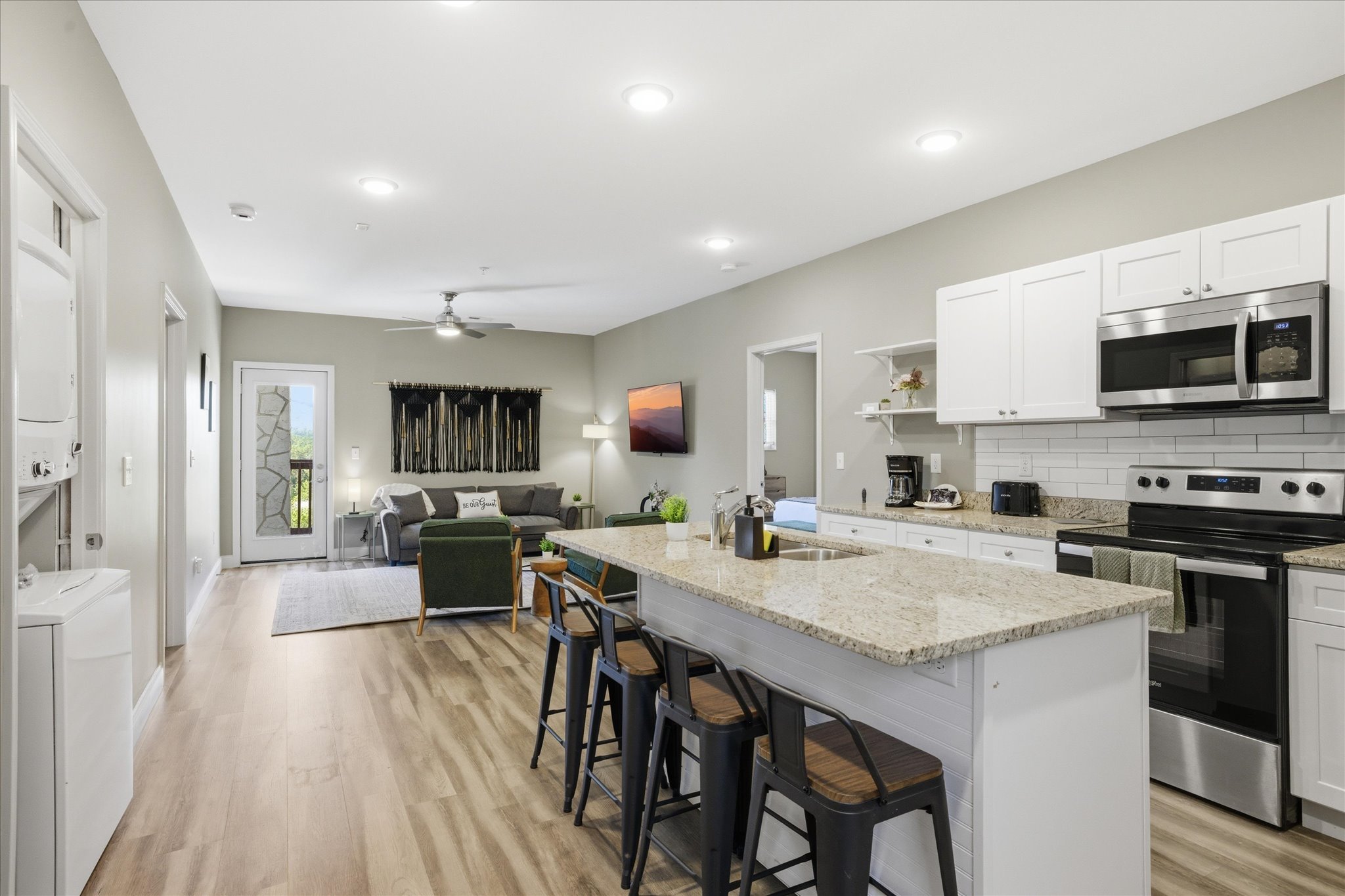 In Unit 2, this is your in-between spot—quick breakfasts, late-night snacks, or just sitting with a drink while everything else is going on around you. Close enough to stay part of it, comfortable enough to linger.