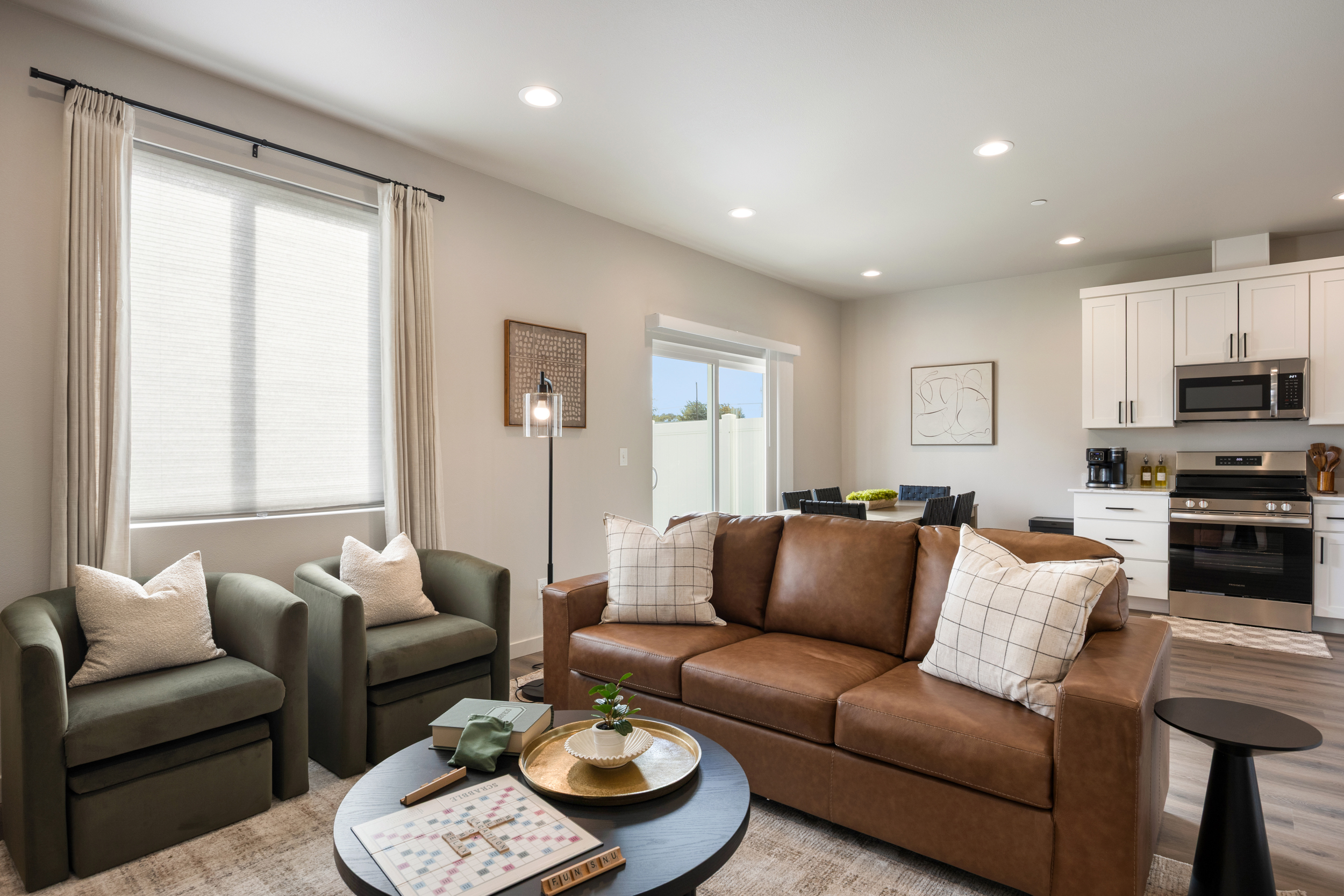 Open living, kitchen, and dining