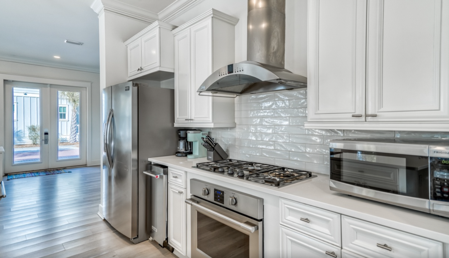 Chef's Kitchen featuring top end appliances