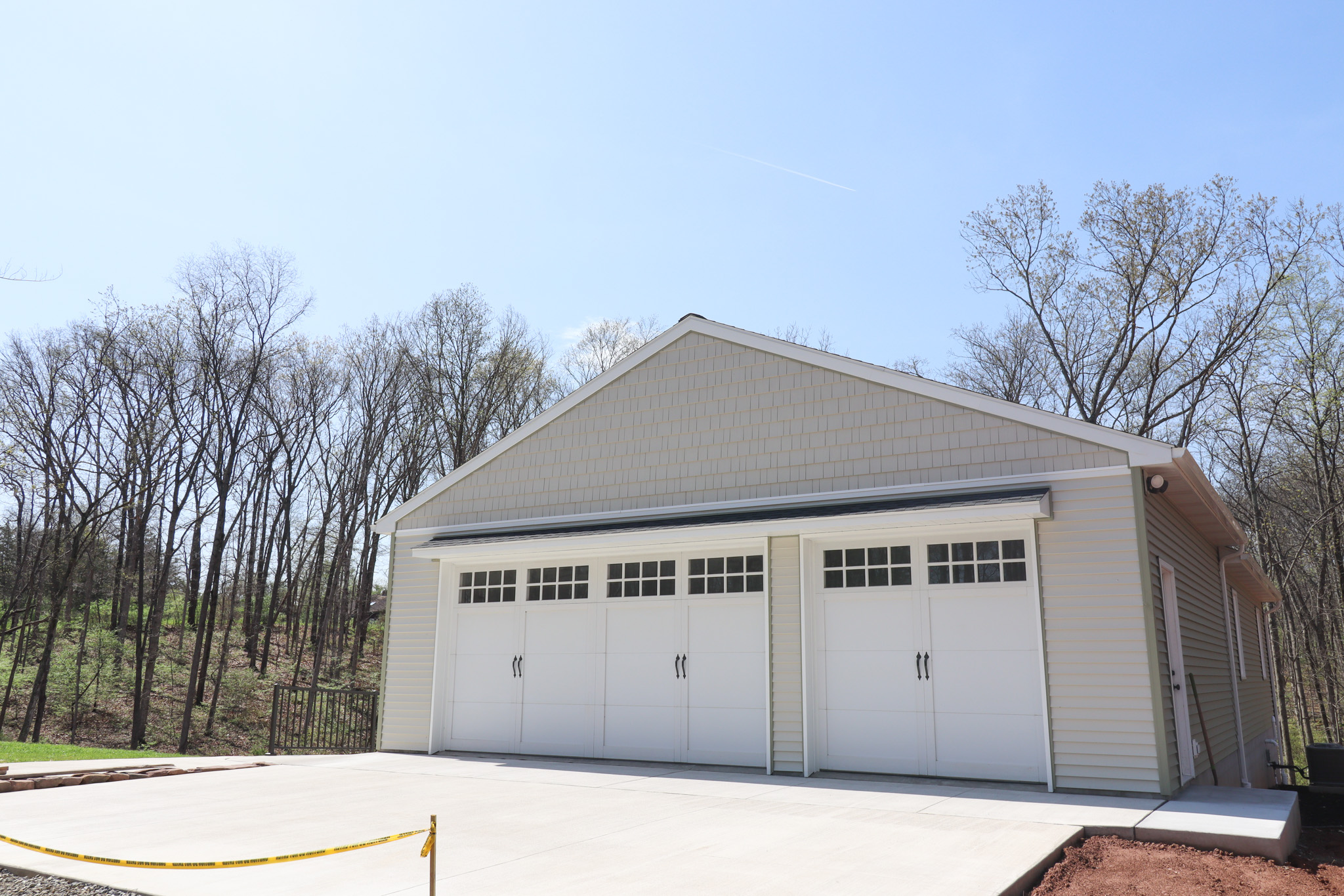 Ample parking in front of the garage