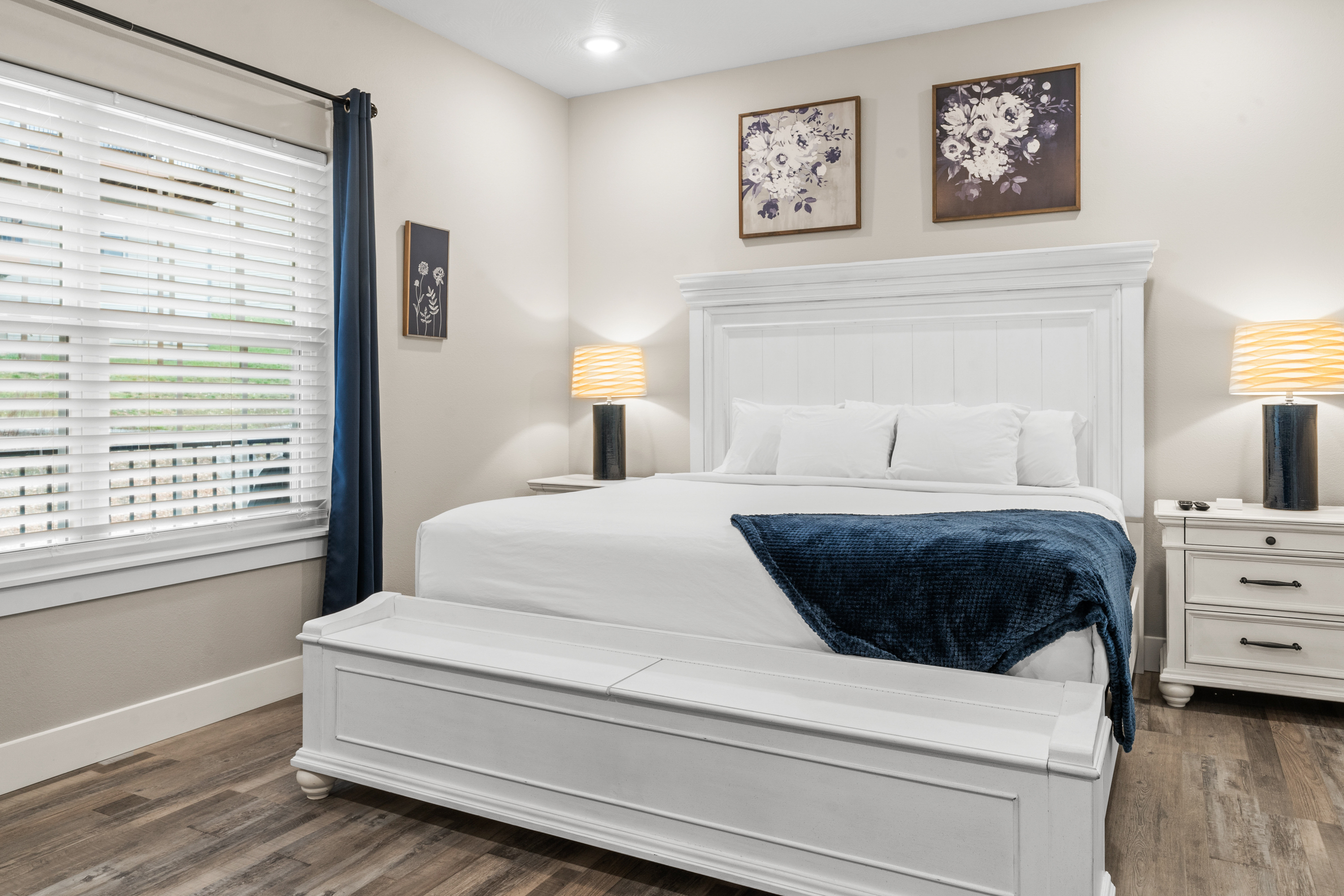 Master Bedroom #1 has a king size bed, dresser, TV. 