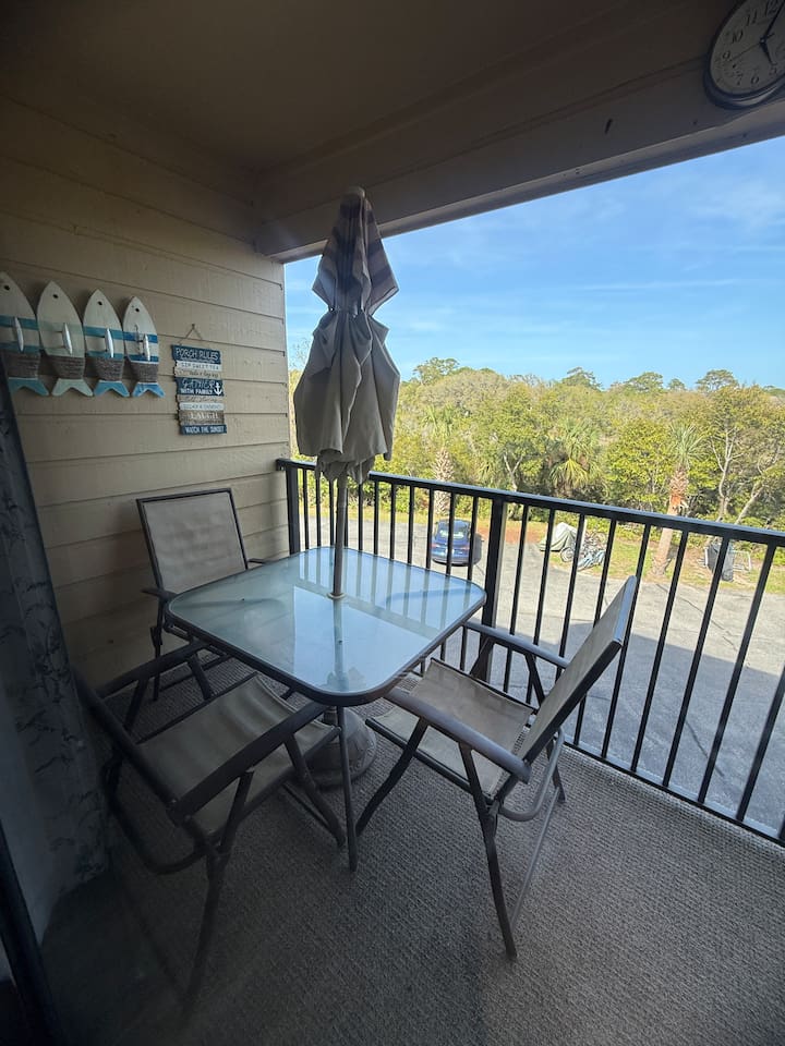 Balcony with glass table
