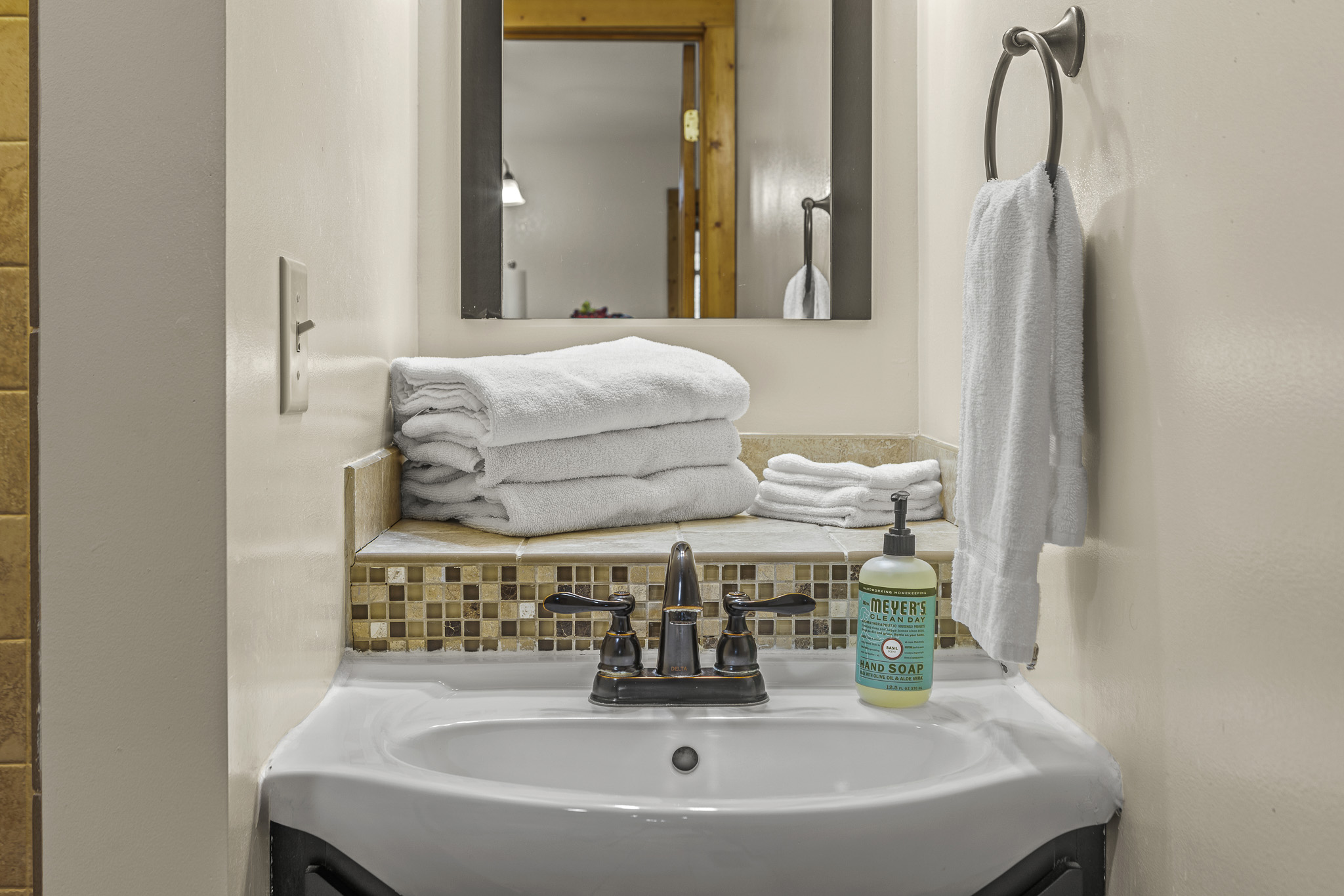 Bathroom Bliss: Fresh towels and stylish details make your getaway refreshingly delightful!