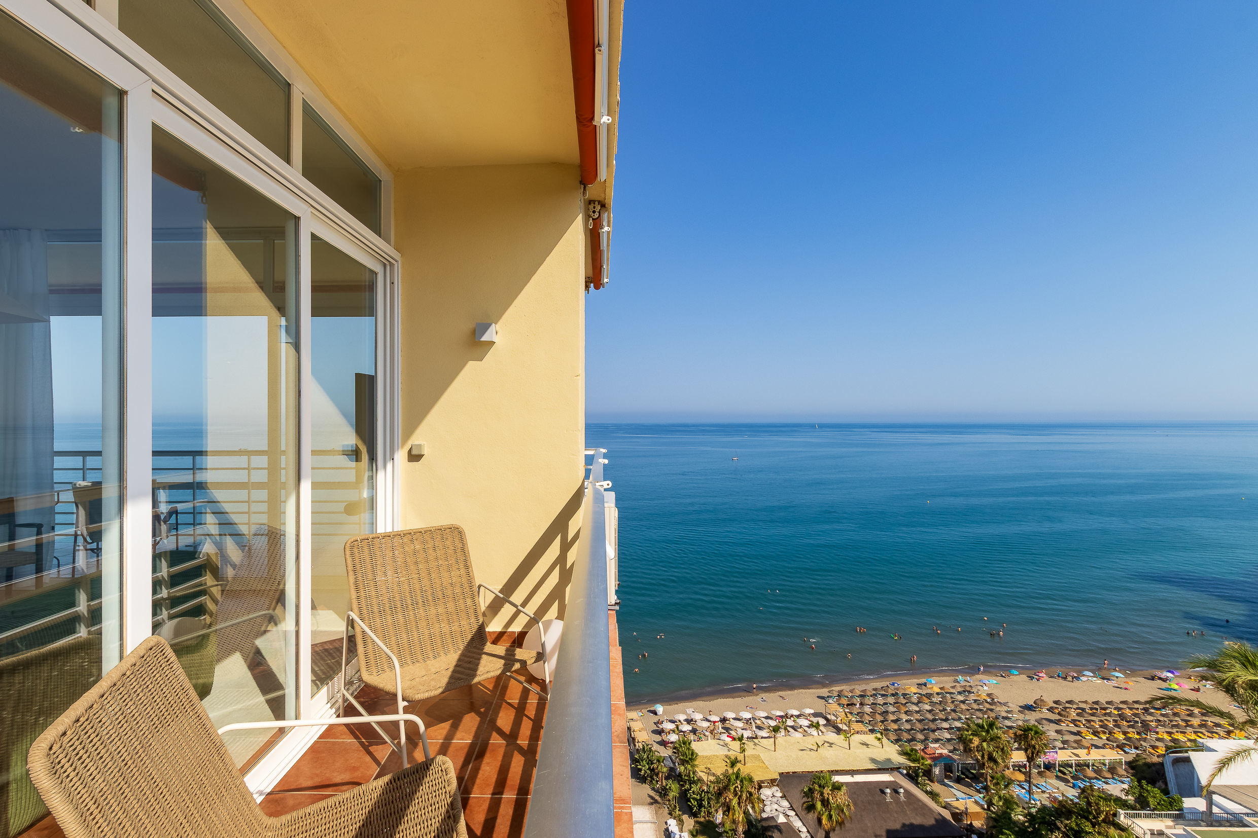 Elevated view over the beach and Mediterranean coastline.