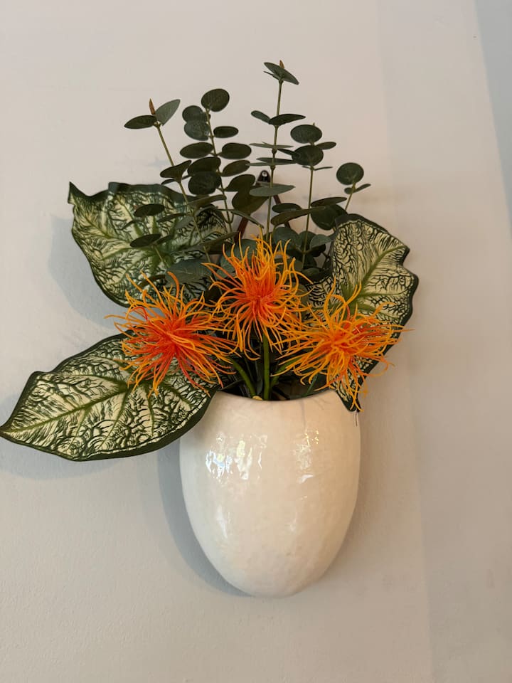 Tropical landscaping throughout.