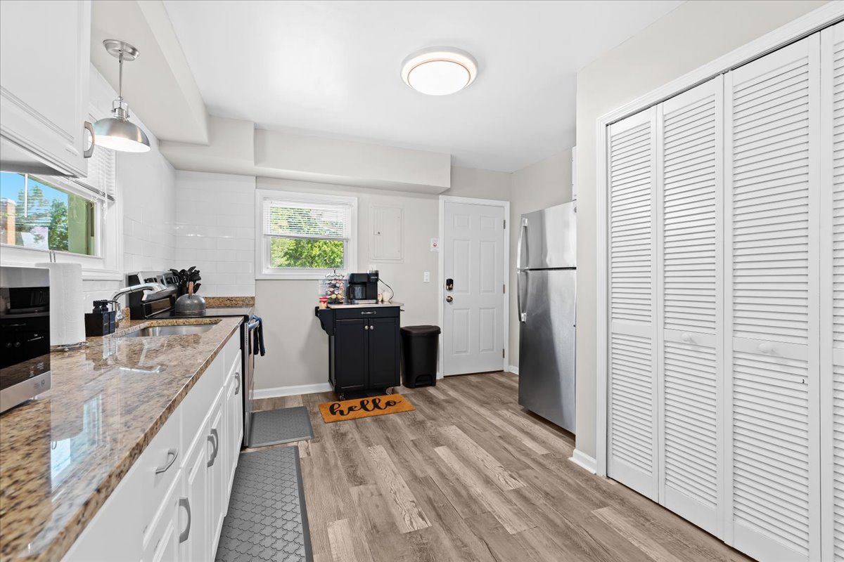 Open kitchen with modern appliances and plenty of counter space