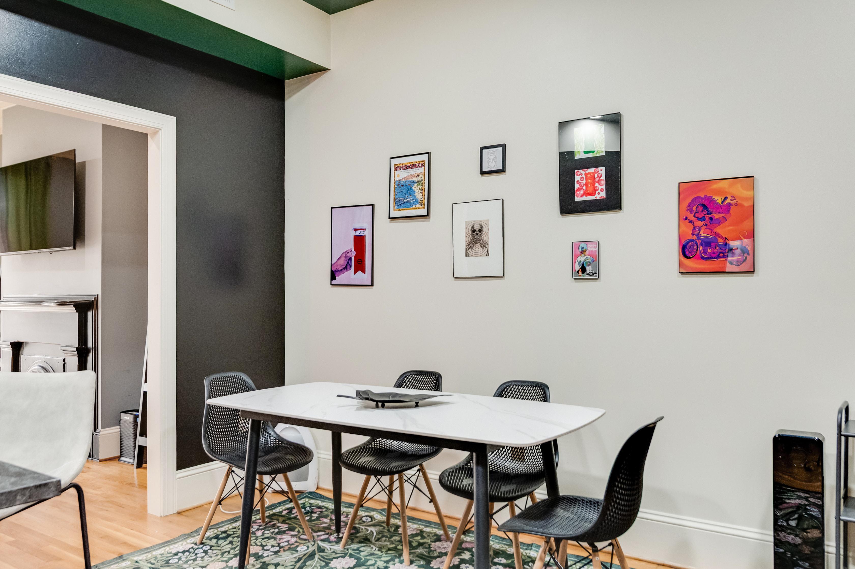 Dining Room: Modern elegance meets artistic flair, perfect for sharing meals and memories!