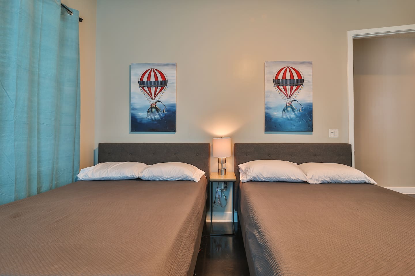 Two full beds in downstairs bedroom #3 with TV.