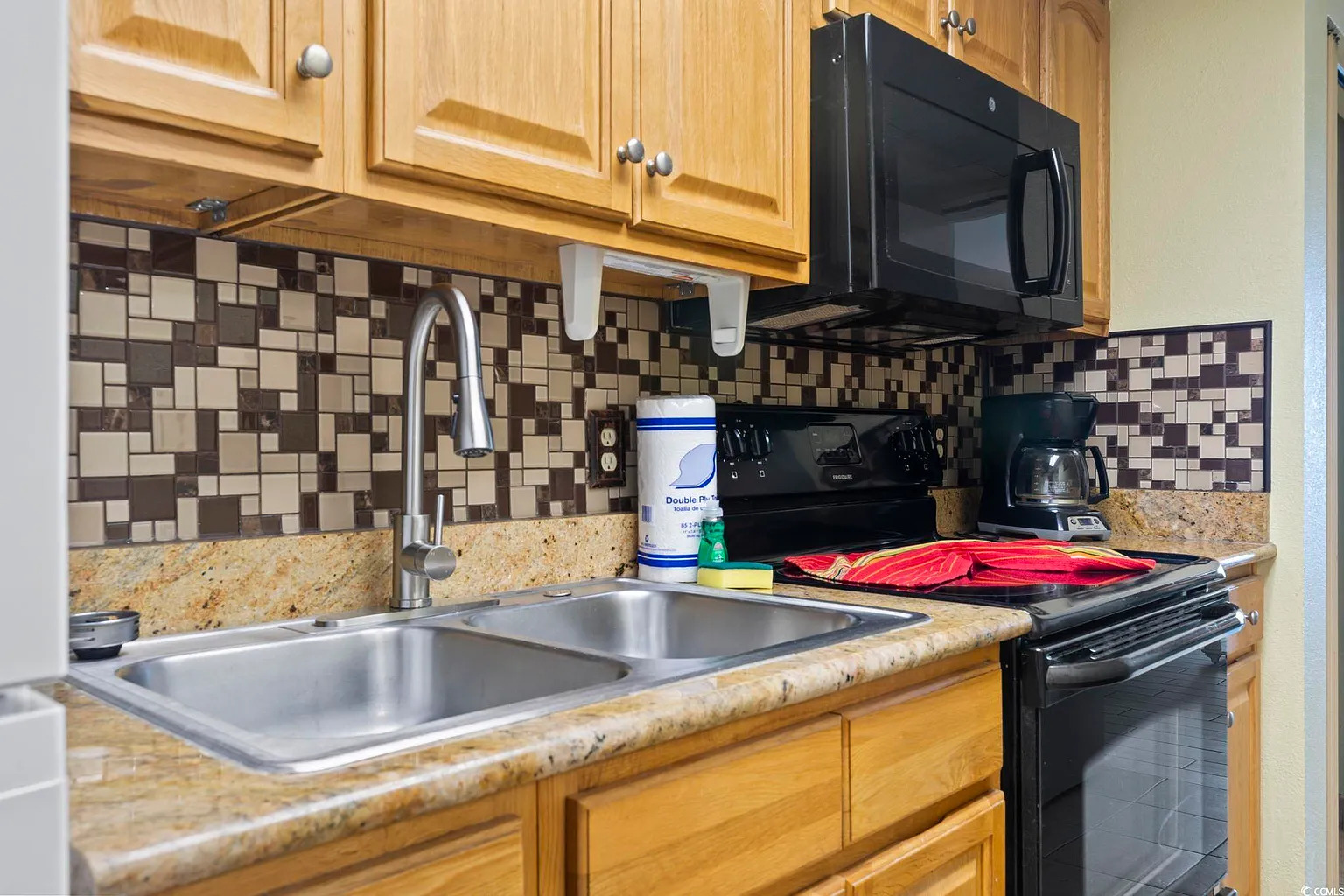 Bright and functional kitchen perfect for cooking after a day at the beach
