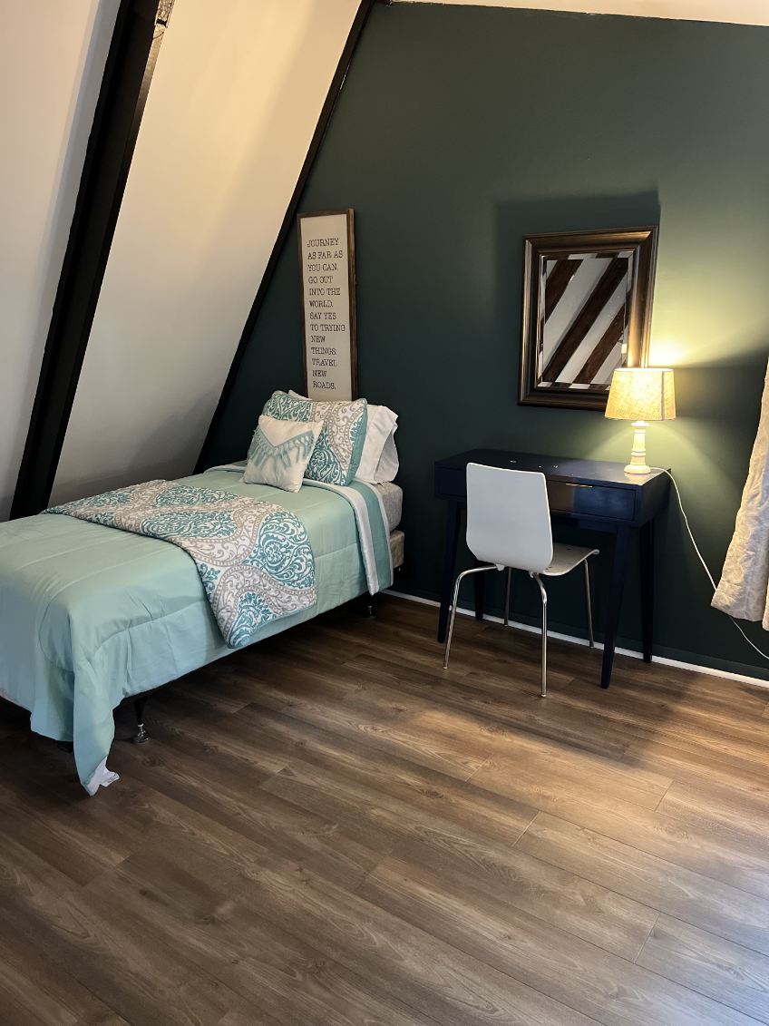 Loft bedroom with a twin bed