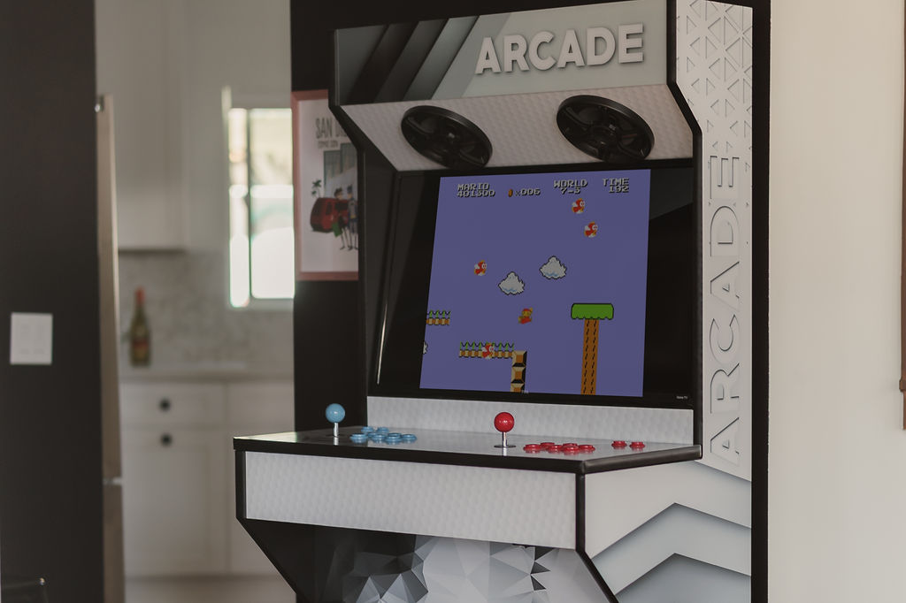 Enjoy thousands of games on this multicade, including classics like Pac-Man and Mario Bros. 
