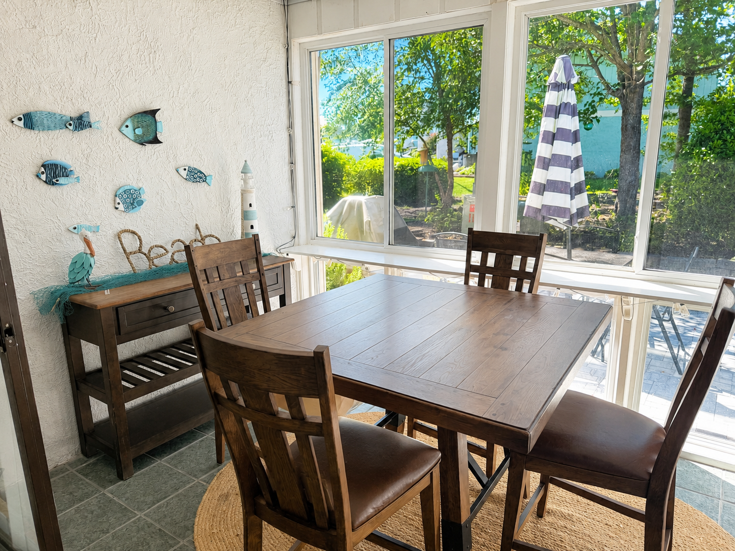 Enjoy morning coffee in the beautiful sunroom! 