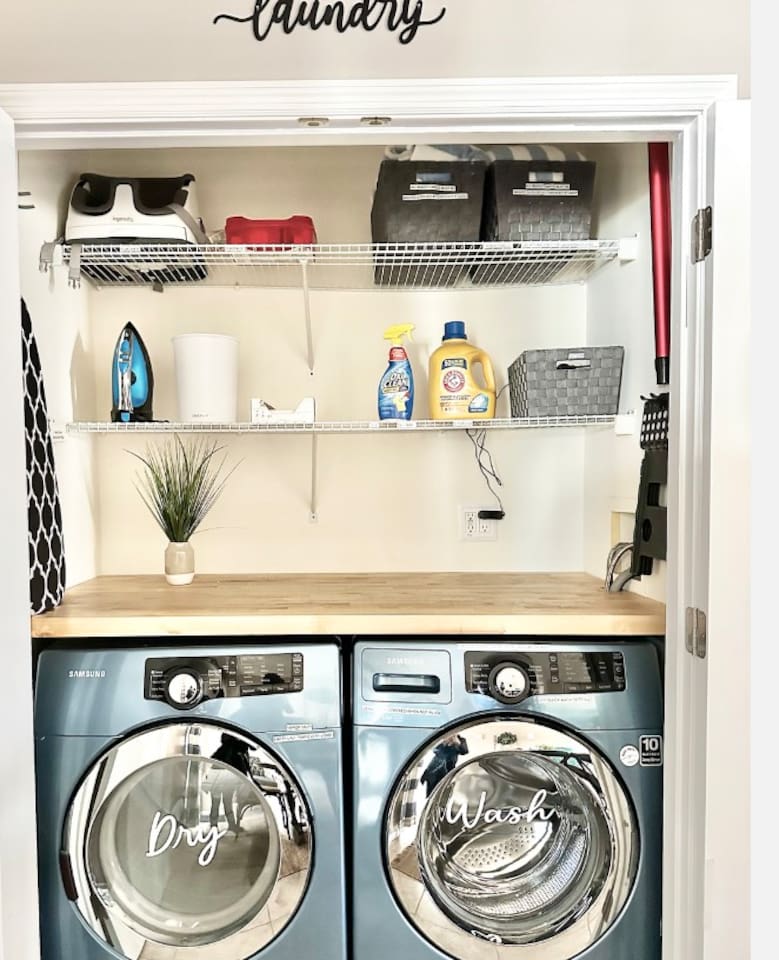 Enjoy the convenience of an in-home laundry nook featuring modern, high-efficiency Samsung front-load machines. Complete with a butcher block folding counter and overhead storage, making chores a breeze during your stay.