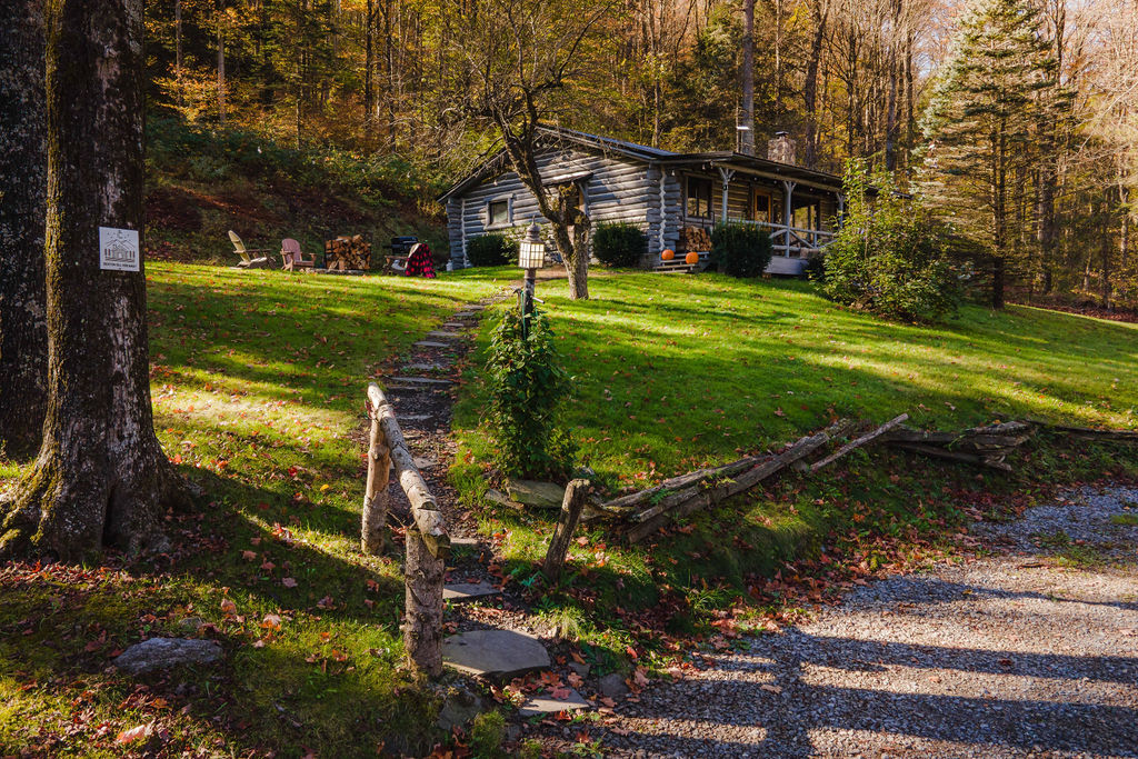 Follow the stone path to your secluded log cabin surrounded by nature and fresh mountain air.