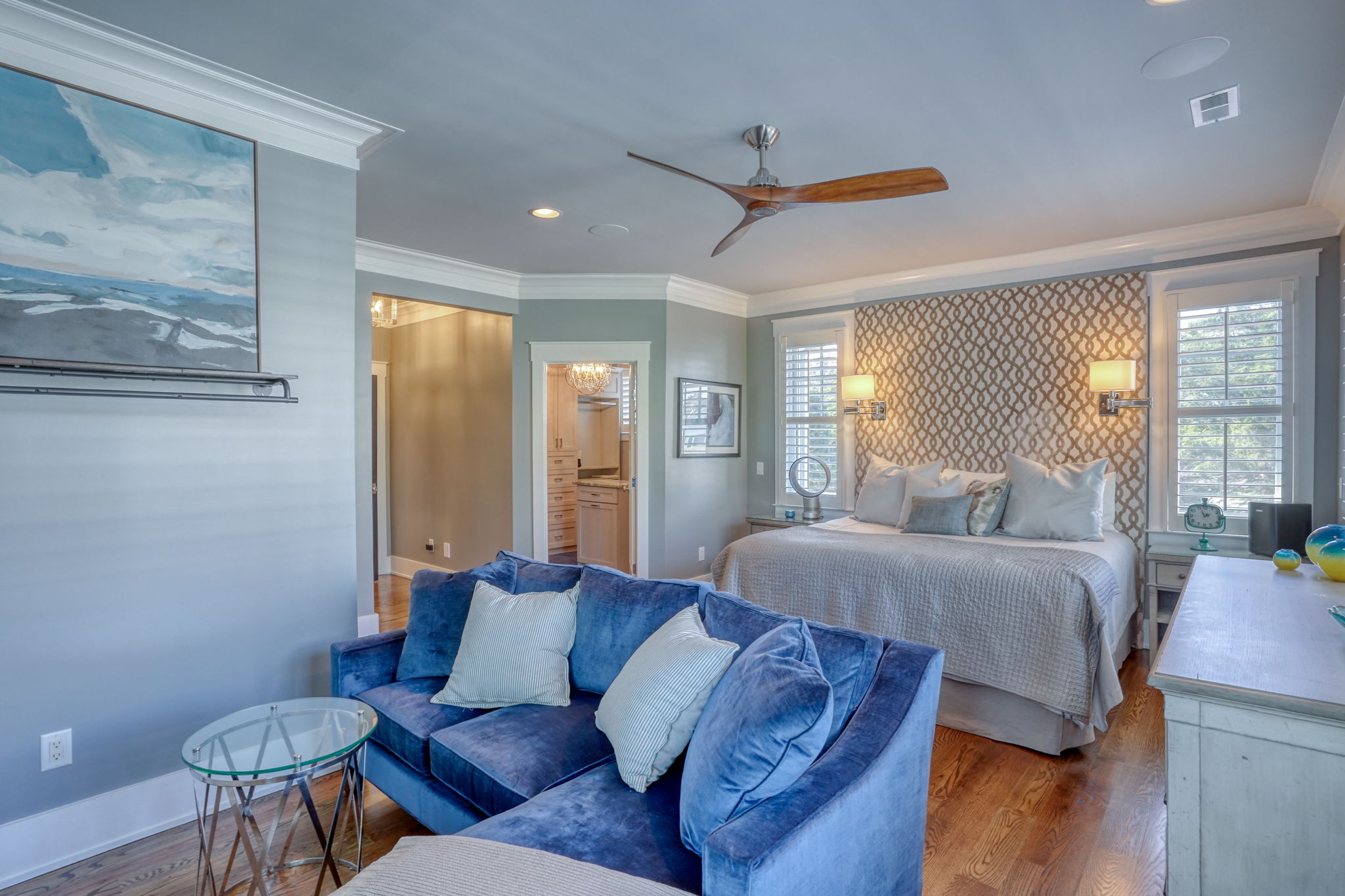 Wake up to soft morning light in the spacious primary retreat