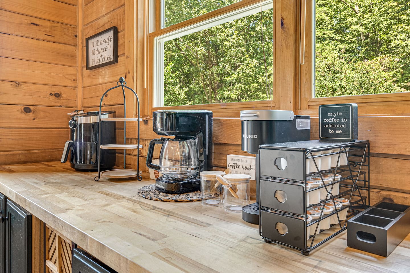 This kitchen has everything you need to whip up delicious meals, including a regular coffee maker, Keurig with pods, sugar, an air fryer, and plenty of pots and pans. Cook, create, and make magic in this fully equipped space!