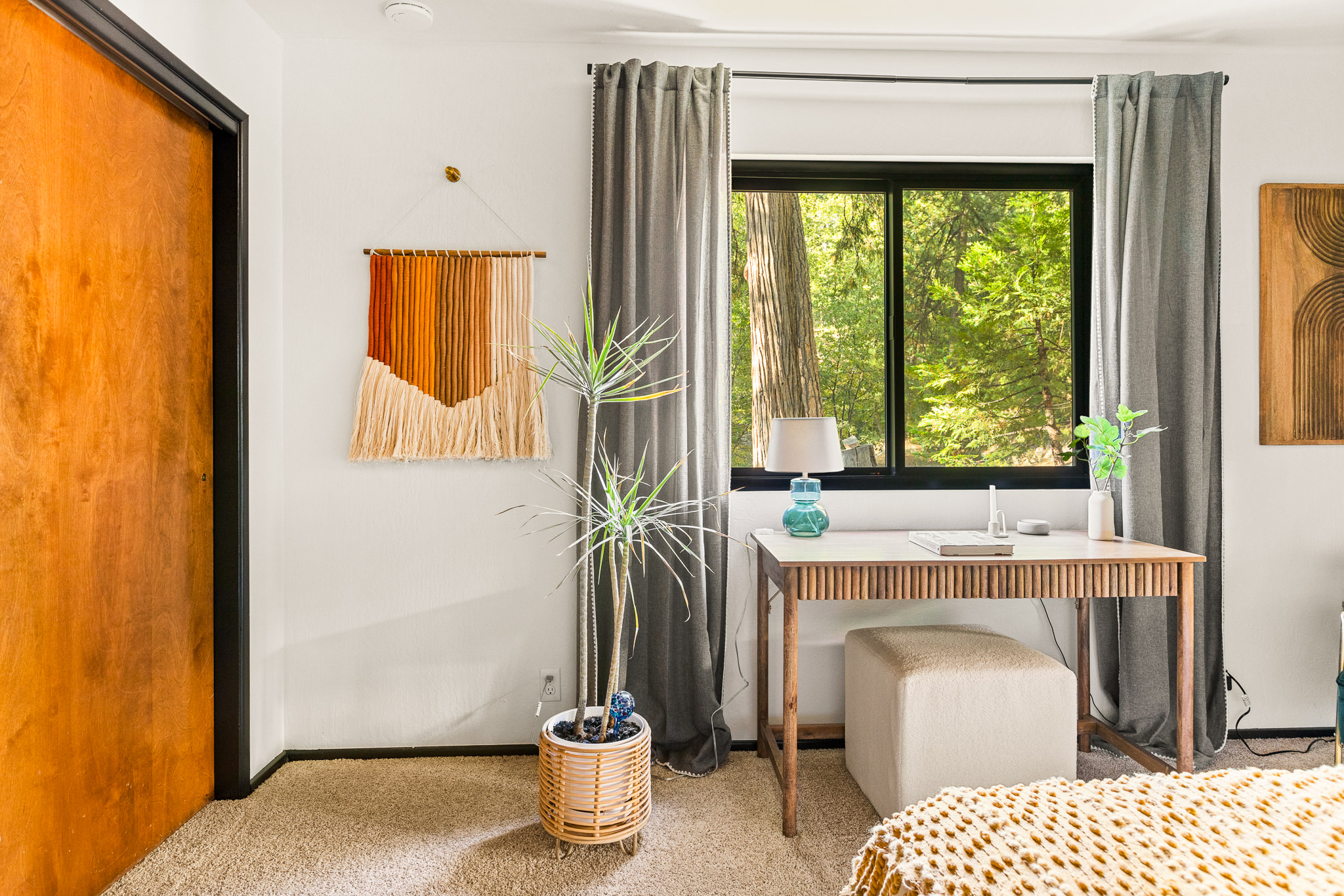 Bedroom 3: Experience the convenience of your own private workspace, allowing you to extend your vacation while comfortably working amidst the serene surroundings of Lake Arrowhead's trees.