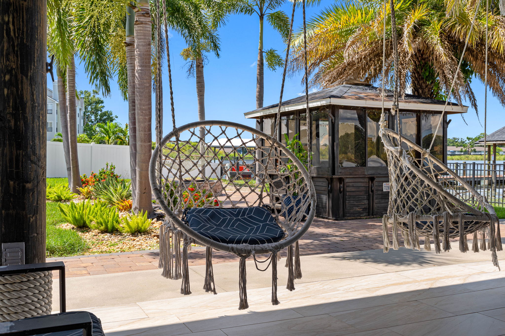 Cook, dine, and relax in this waterfront pavilion with ample seating, bar stools, and panoramic views of the water.