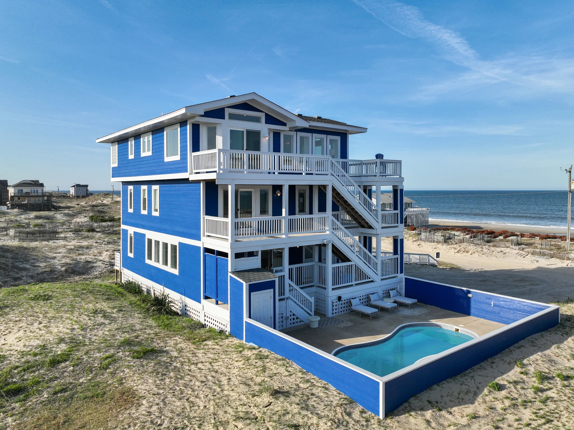 View of the pool on the side of the house
