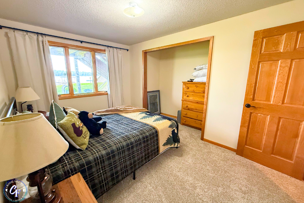 Lower-level Bedroom with queen bed
