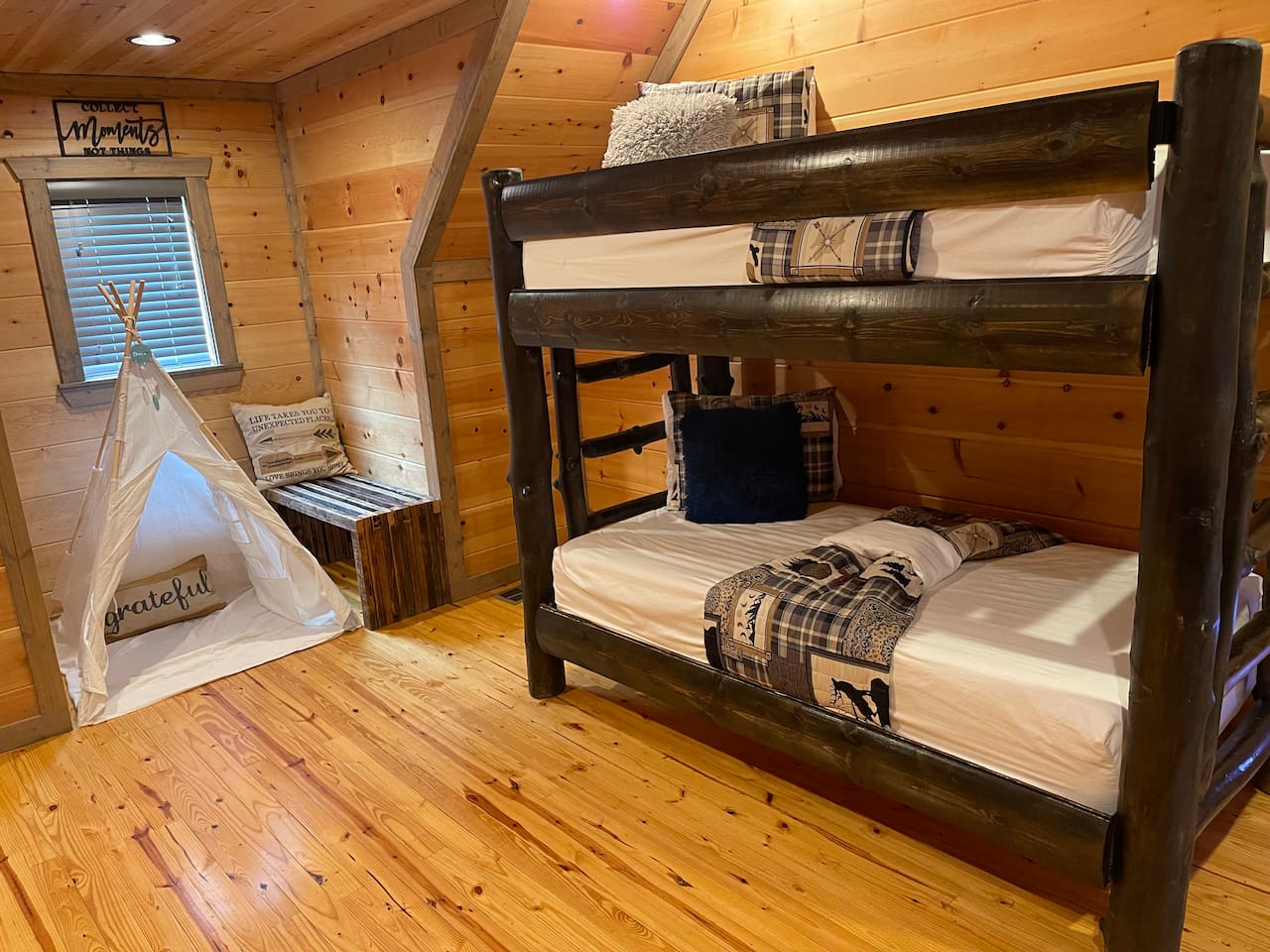 The gameroom is complete with XL bunk beds and a TEEPEE!!This space is upstairs adjacent to the 2nd Master bedroom. It is officially the game room, but has four walls with an oversized bunk bed that sleeps just like a 3rd bedroom.