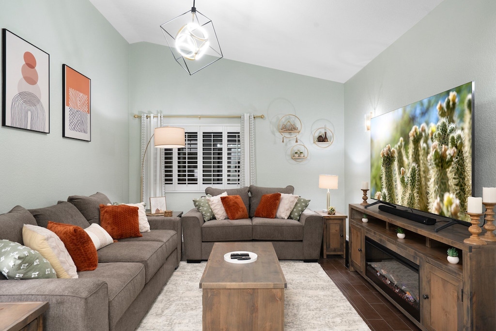 Sink into this super cozy and comfy living room with a massive 75" smart TV!