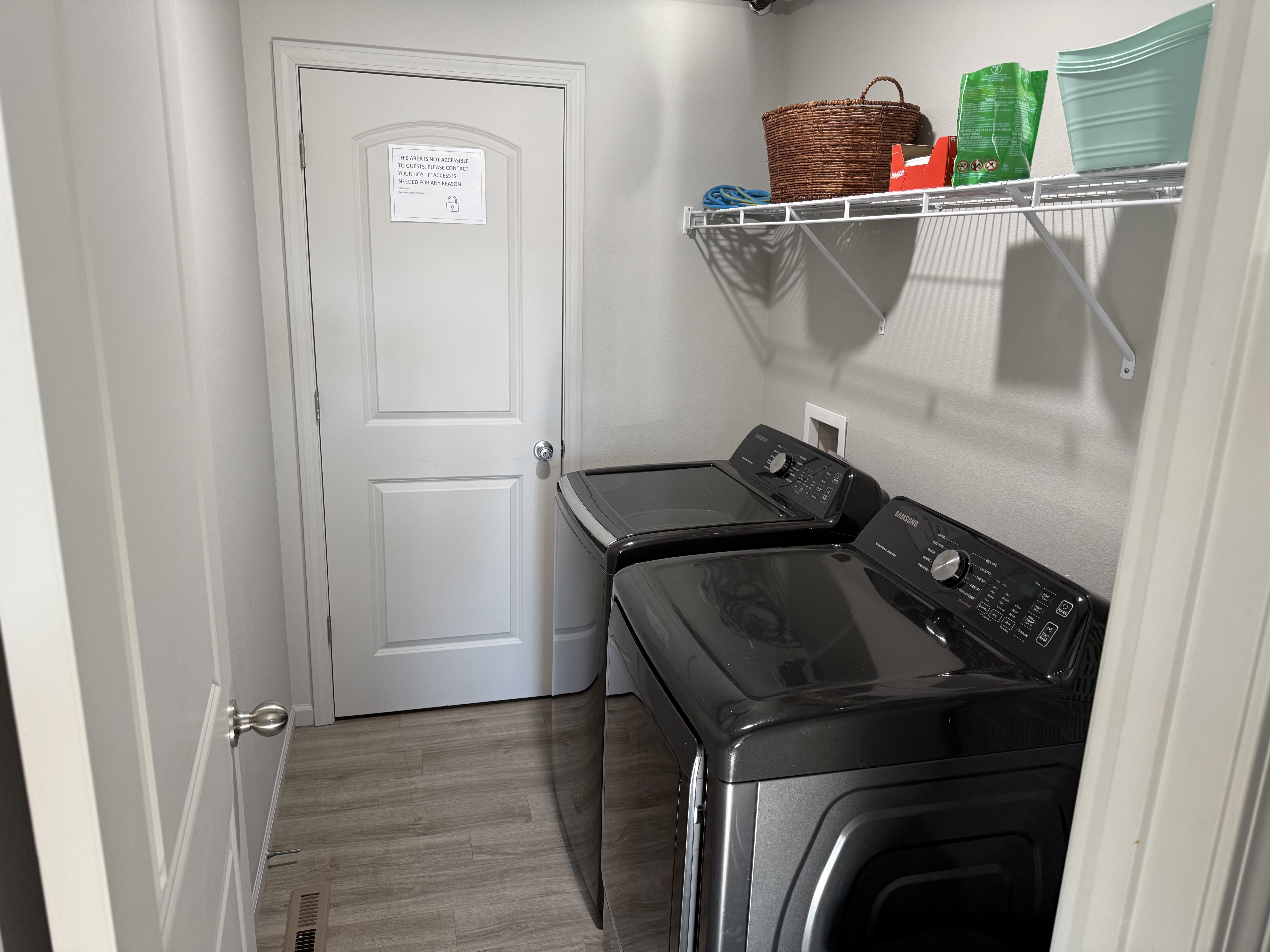 High efficiency washer and dryer. Starter supply of detergent is provided