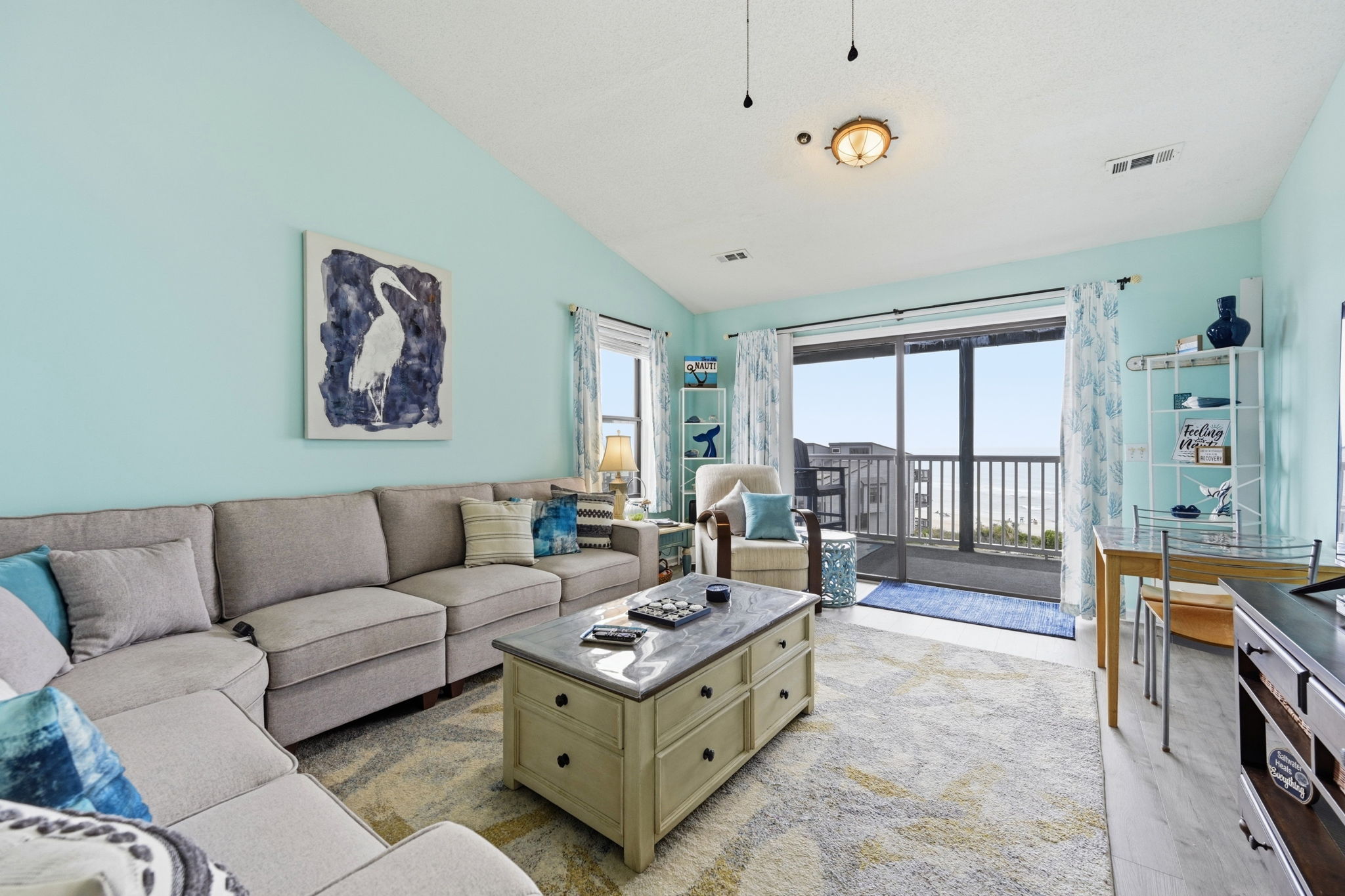 Stretch out, get cozy, and enjoy stunning ocean views from the comfort of the large couch