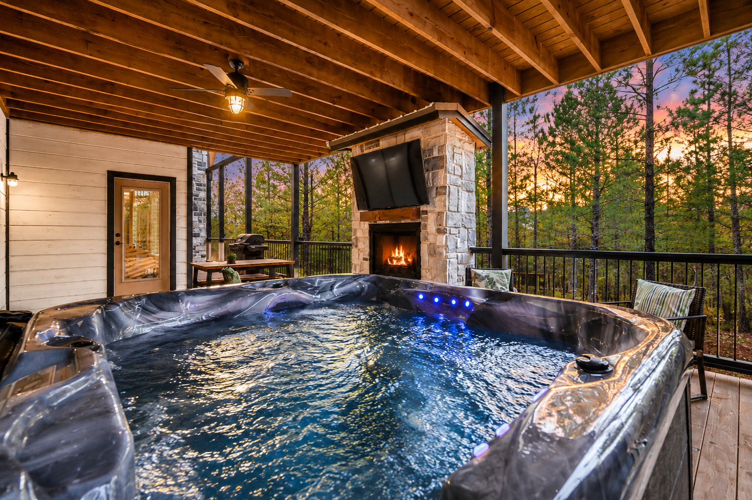 Hot tub evenings just hit different out here.
Tucked beneath the covered deck, wrapped in pine views and quiet moments, this is where the day slows down and the getaway finally settles in.