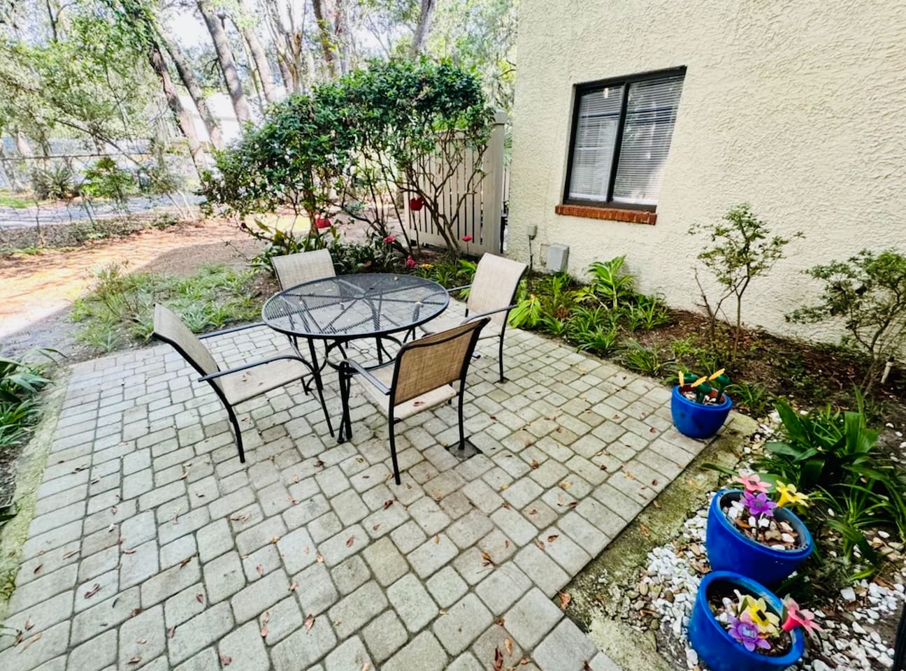 Patio with bistro table and flowers