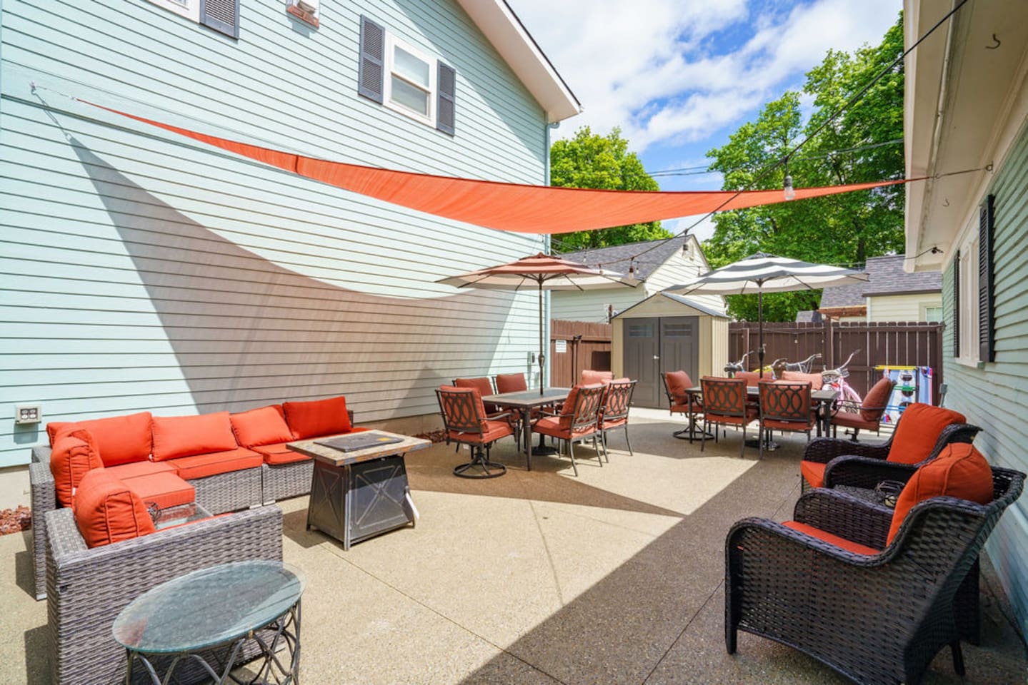 Relax and dine on your spacious back patio with seating for 12! Featuring a comfortable outdoor sofa, lounge chairs and a sun shade, it’s just steps away from the hot tub.