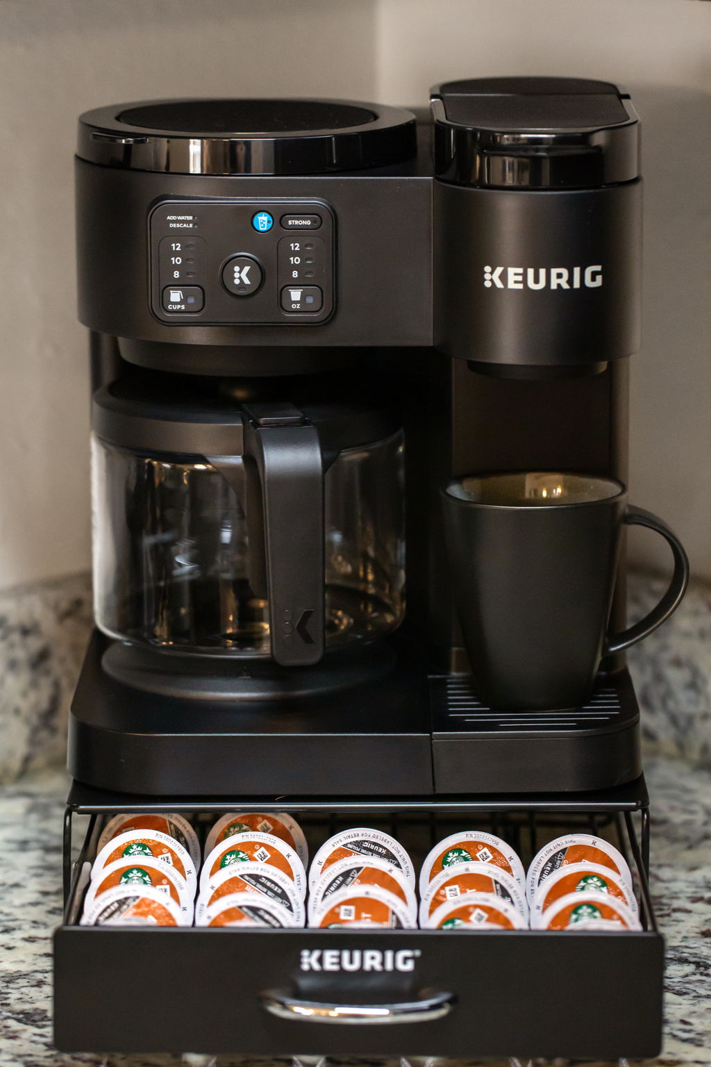 Coffee bar setup for K-cups or brewed coffee, including creamer