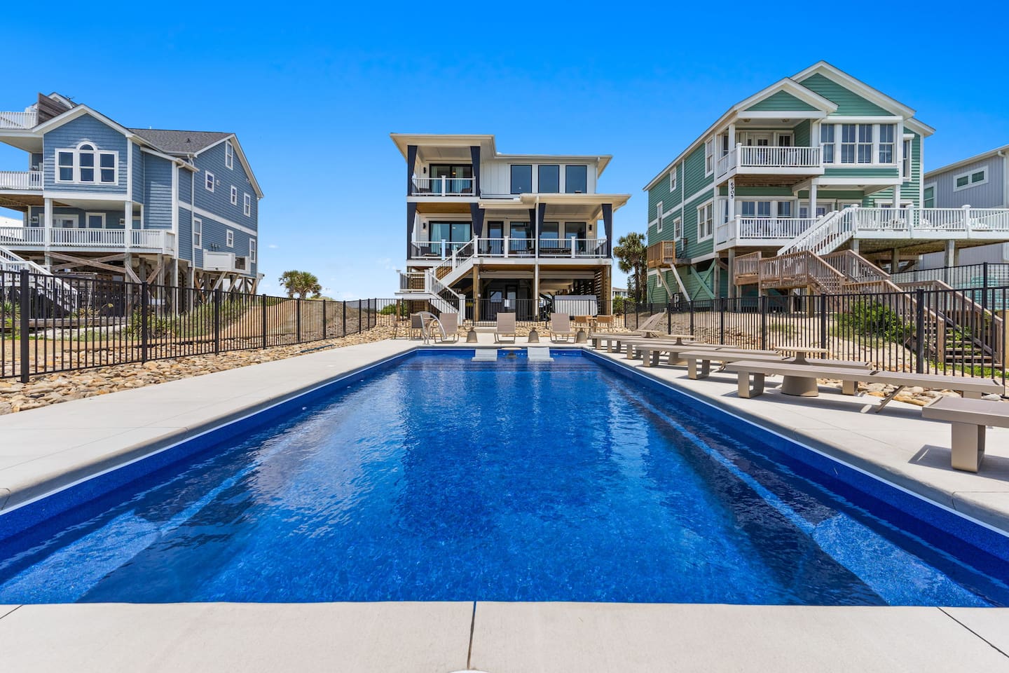 Welcome to Zen, Oak Island’s newest luxury oceanfront retreat. Designed with large groups in mind, this one-of-a-kind home blends resort-style amenities, spacious gathering areas, & private suites to create the ultimate setting for your next getaway.
