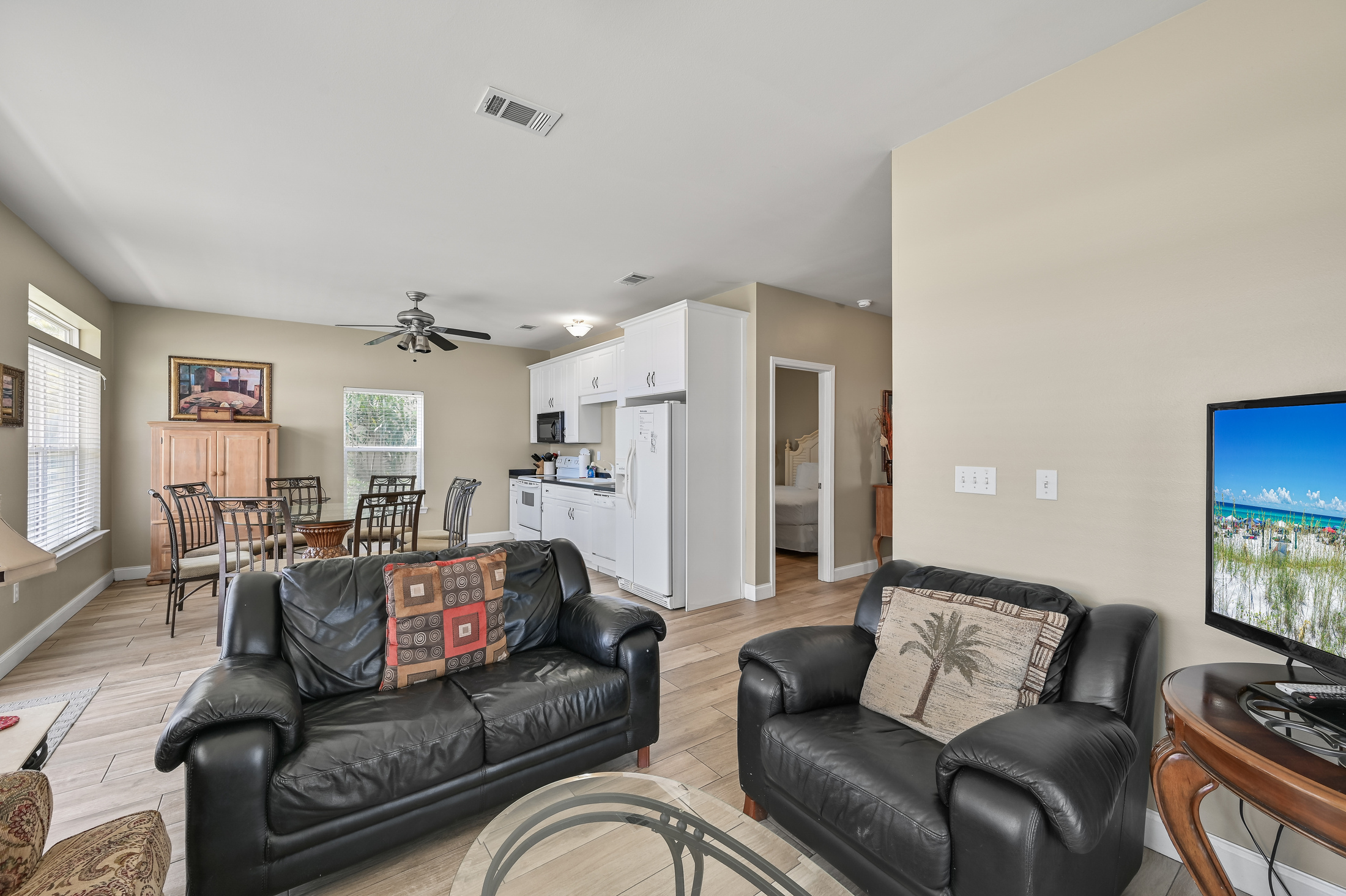 Living Room – Sleeper sofa, loveseat, accent chairs & large TV