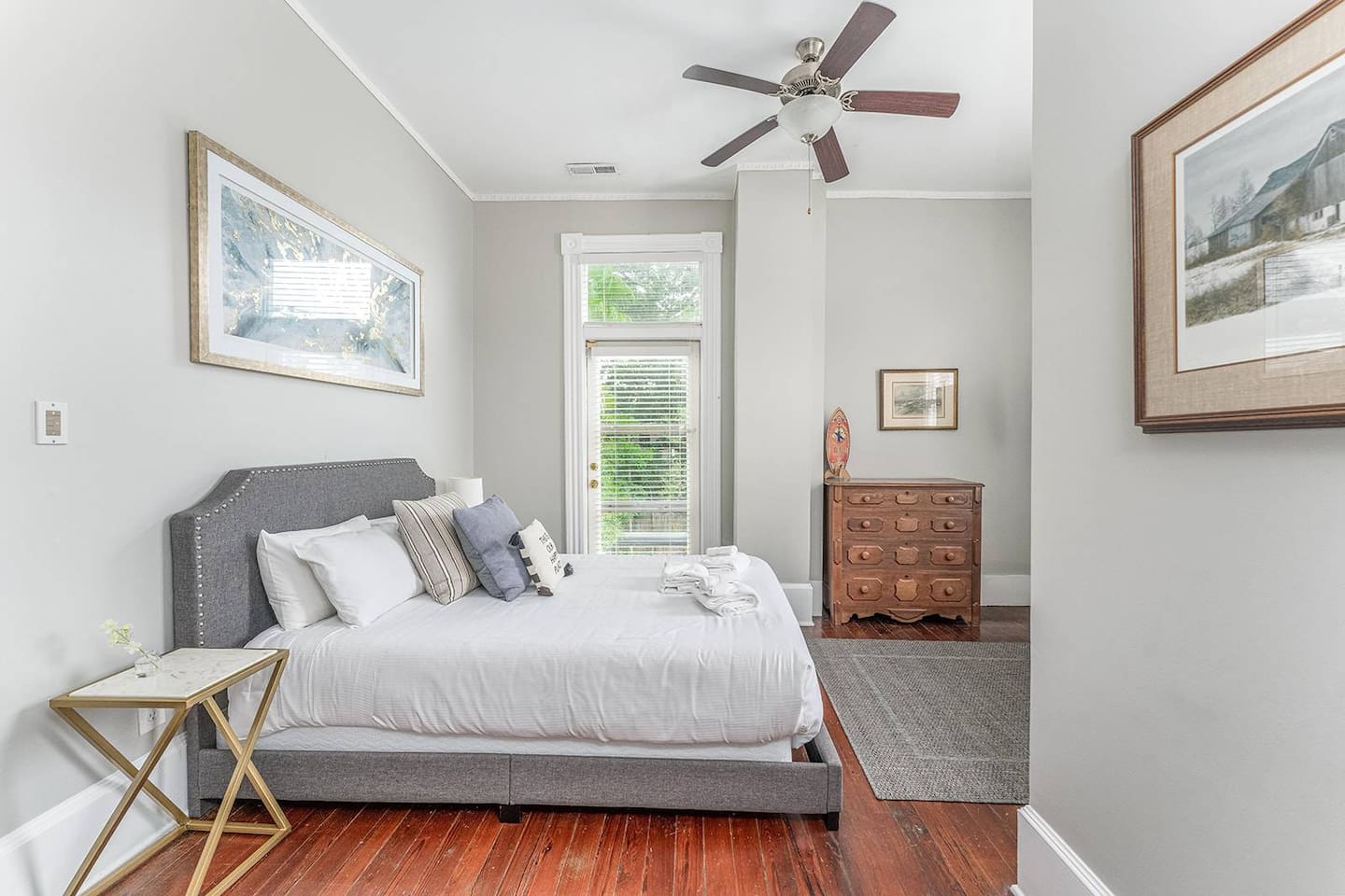 Spacious bedroom with views of both the backyard/pool as well as the side of the home provides plenty of natural light throughout the day.