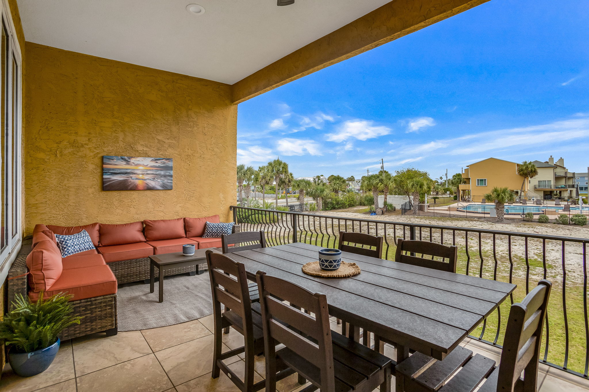 Balcony overlooking large pool