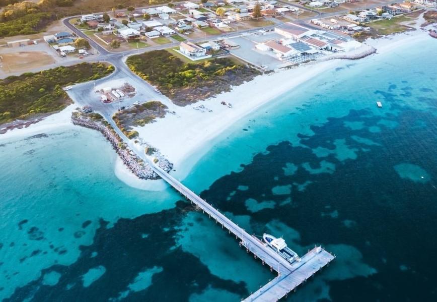 Airial shot of Shoreline & jetty close by