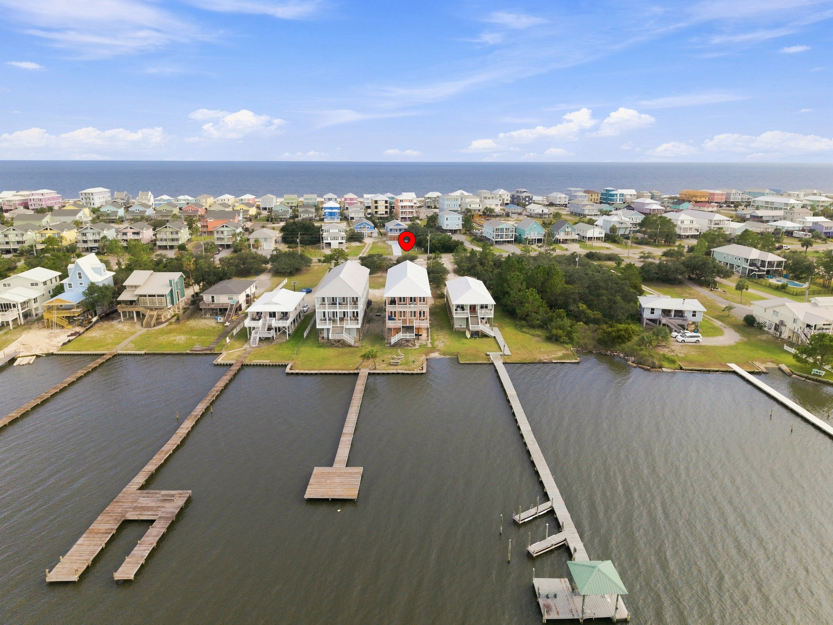 Aerial of waterfront homes and private docks along Little Lagoon