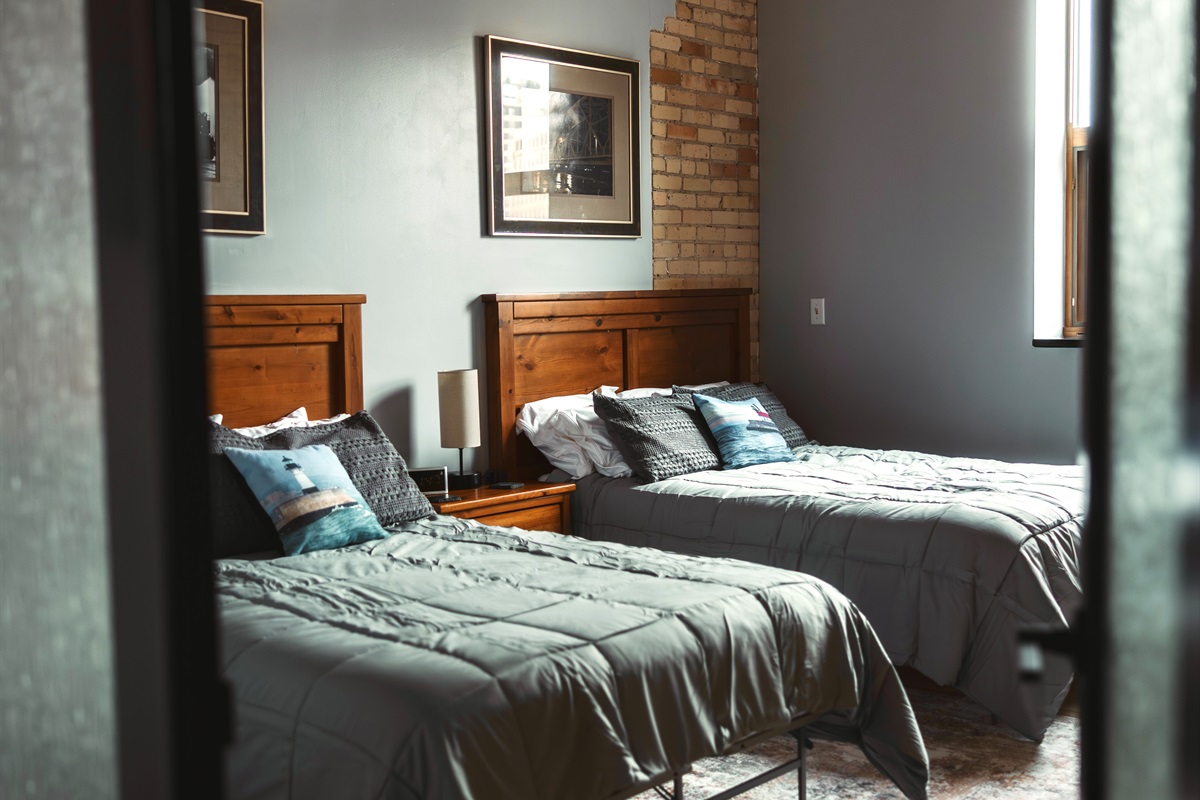 Welcome to Captain's Quarters by The Brix! A newly renovated 2-Bedroom, 2-Bathroom corner suite with spectacular views of the William A. Irvin and downtown. Perfect for families, this spacious condo features a full kitchen, foosball, air hockey, and pool!