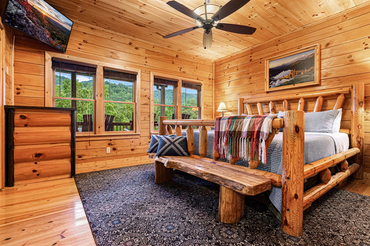 Wake Up to the Views: Enjoy breathtaking mountain vistas from this serene bedroom.
